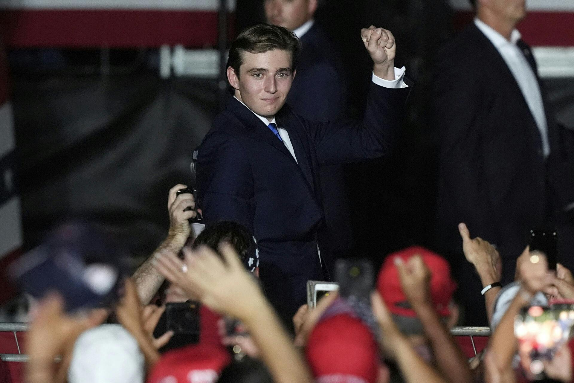 Barron Trump gestures after his father Republican presidential candidate former President Donald Trump introduced him during a campaign rally at Trump National Doral Miami, Tuesday, July 9, 2024, in Doral, Fla. (AP Photo/Marta Lavandier)