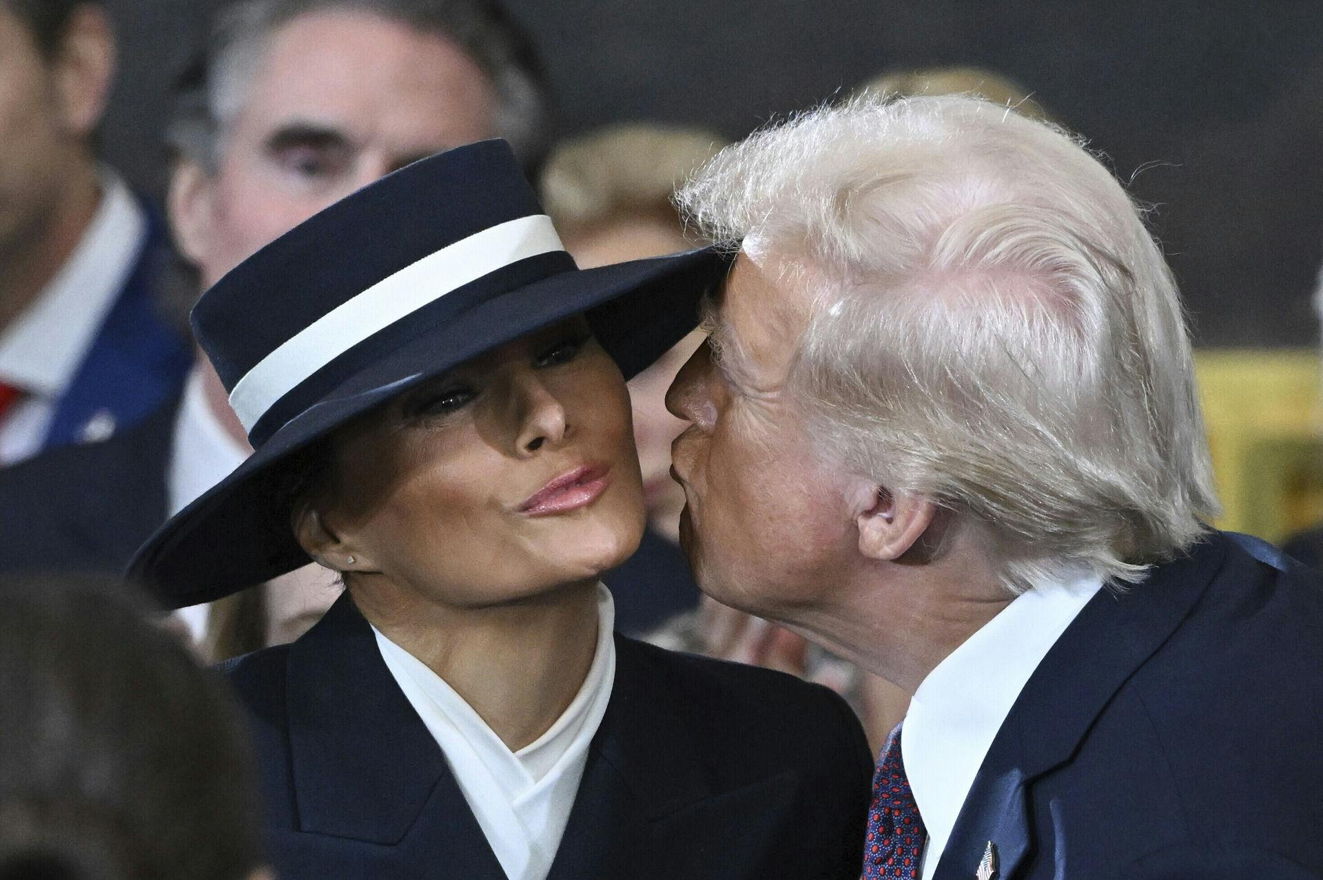 US President-elect Donald Trump kisses Melania Trump as he arrives for the inauguration ceremony before he is sworn in as the 47th US President in the US Capitol Rotunda in Washington, DC, on January 20, 2025. (Photo by SAUL LOEB / POOL / AFP) Photo by: SAUL LOEB/picture-alliance/dpa/AP Images