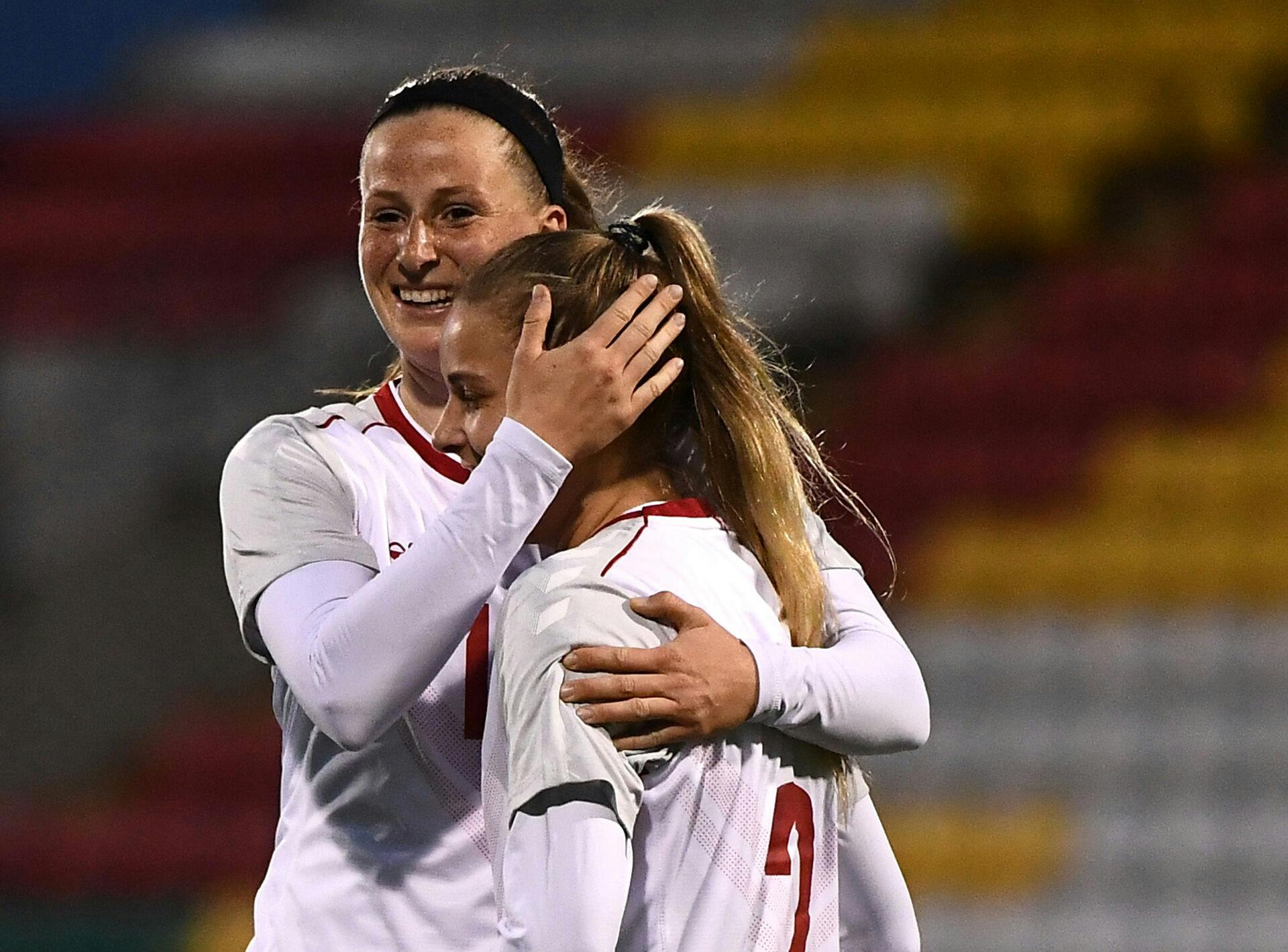 Soccer Football - Women's International Friendly - Republic of Ireland v Denmark - Tallaght Stadium, Dublin, Republic of Ireland - April 8, 2021 Denmark's Nicoline Sorensen and Olivia Holdt celebrate after the match REUTERS/Clodagh Kilcoyne