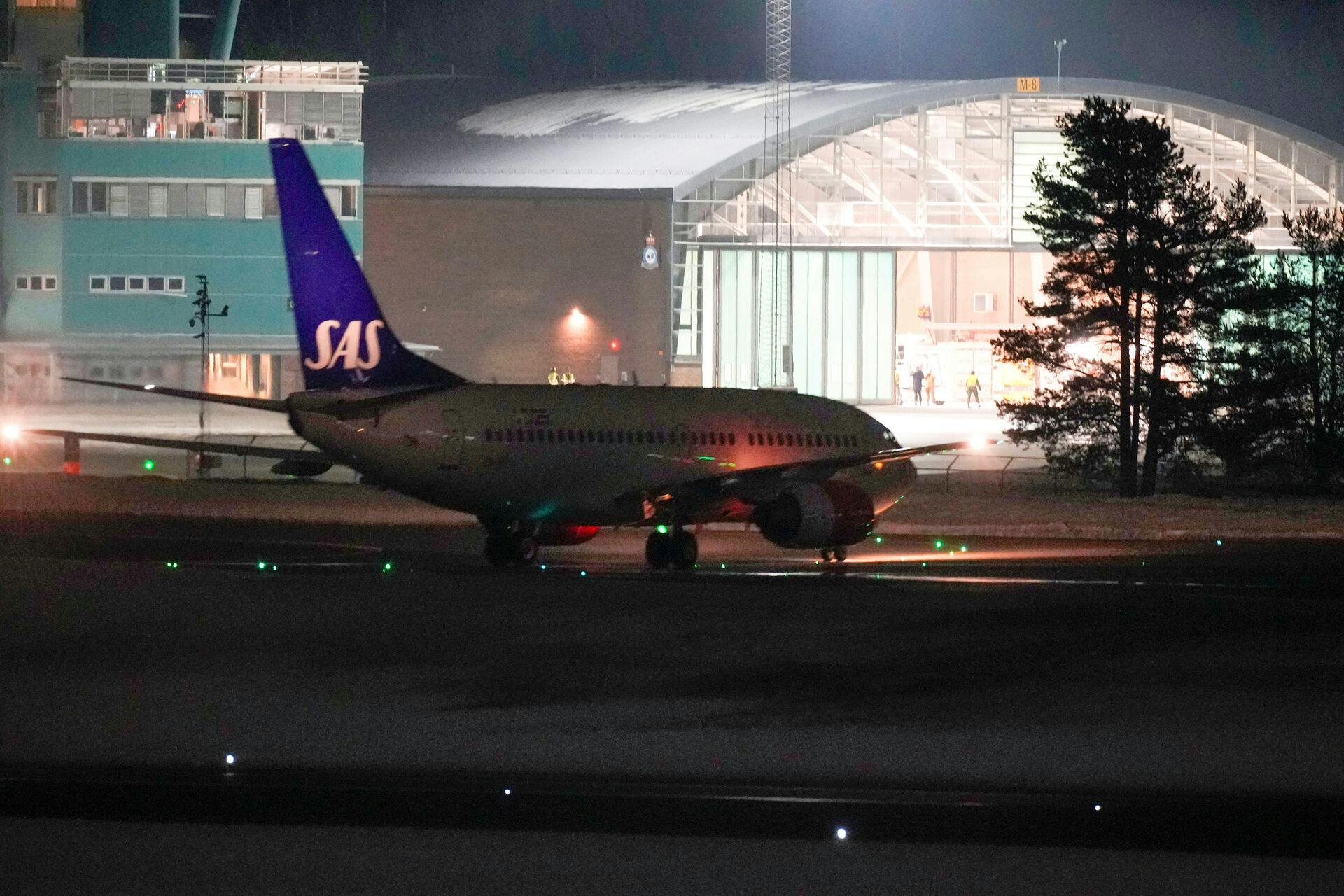 An aircraft belonging to SAS and requisitioned by the Norwegian Armed Forces as an evacuation plane with Norway's King Harald on board after he was discharged from a Malaysian hospital, arrives at the Oslo Airport, in Gardermoen, Norway March 3, 2024 Javad Parsa/NTB/via REUTERS ATTENTION EDITORS - THIS IMAGE WAS PROVIDED BY A THIRD PARTY. NORWAY OUT.NO COMMERCIAL OR EDITORIAL SALES IN NORWAY.