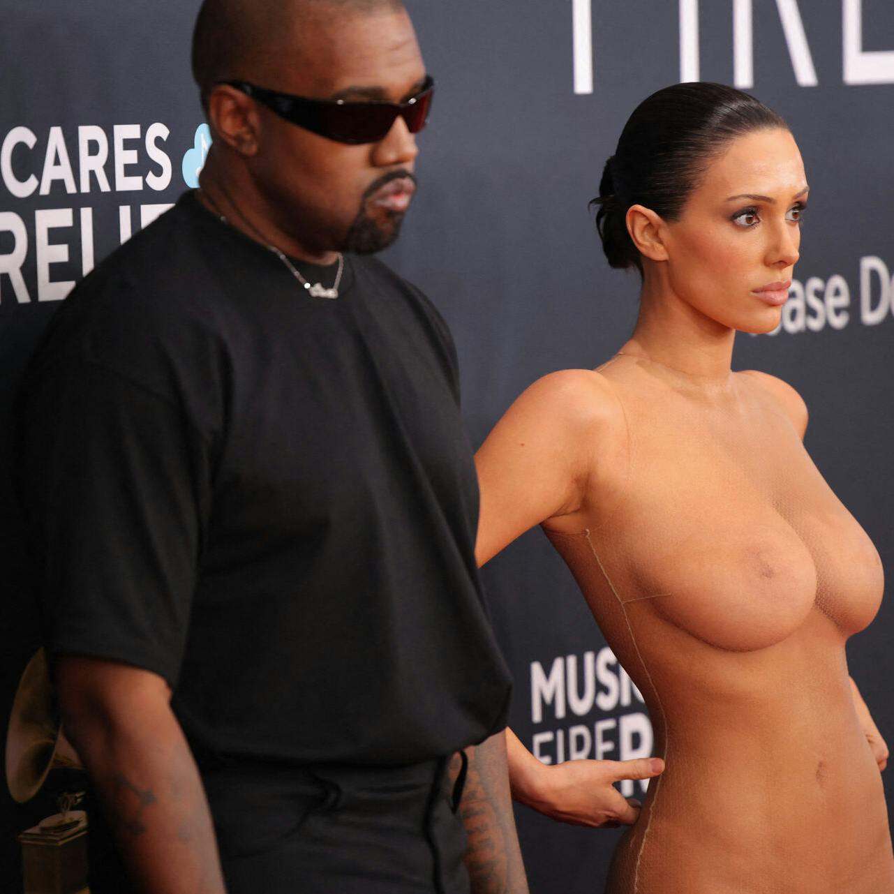 Kanye West and Bianca Censori pose at the red carpet during the 67th Annual Grammy Awards in Los Angeles, California, U.S., February 2, 2025. REUTERS/Daniel Cole SENSITIVE MATERIAL. THIS IMAGE MAY OFFEND OR DISTURB.