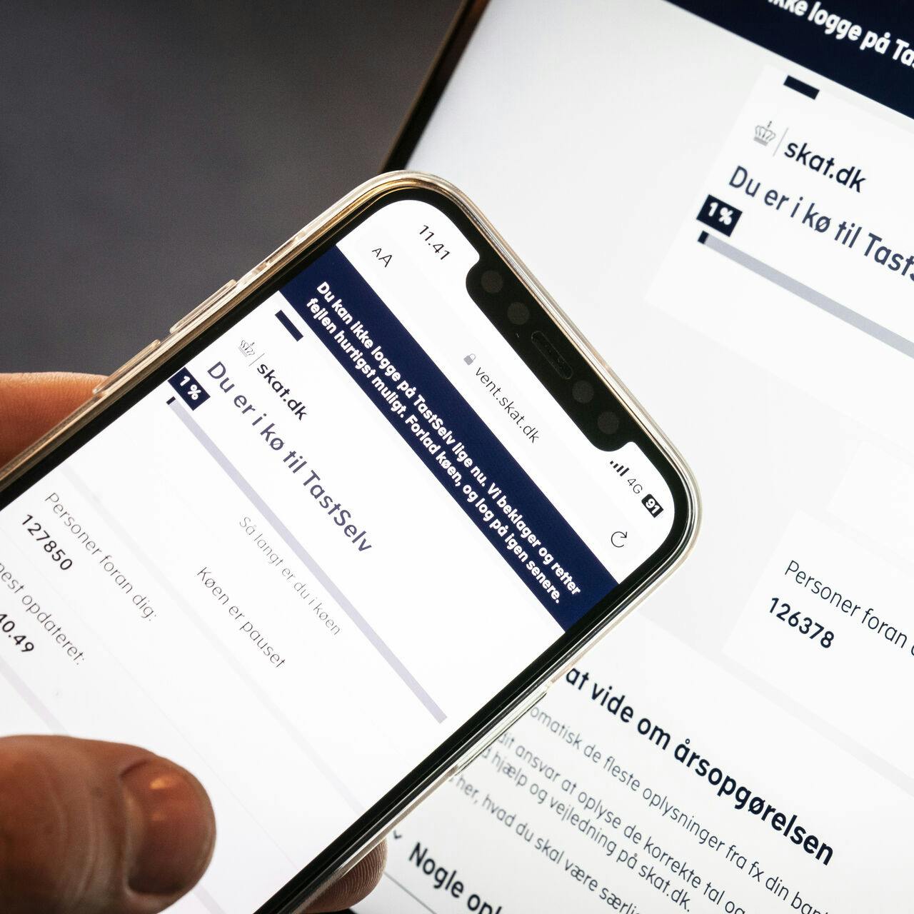 Affotografering af skat.dk på computer, hvor tusindvis af borgere er i kø for at se deres årsopgørelse, fredag den 10. marts 2023. Den officielle åbningsdag er mandag den 13. marts, men tidligere år har Skattestyrelsen åbnet årsopgørelsen fredagen inden.. (Foto: Mads Claus Rasmussen/Ritzau Scanpix)