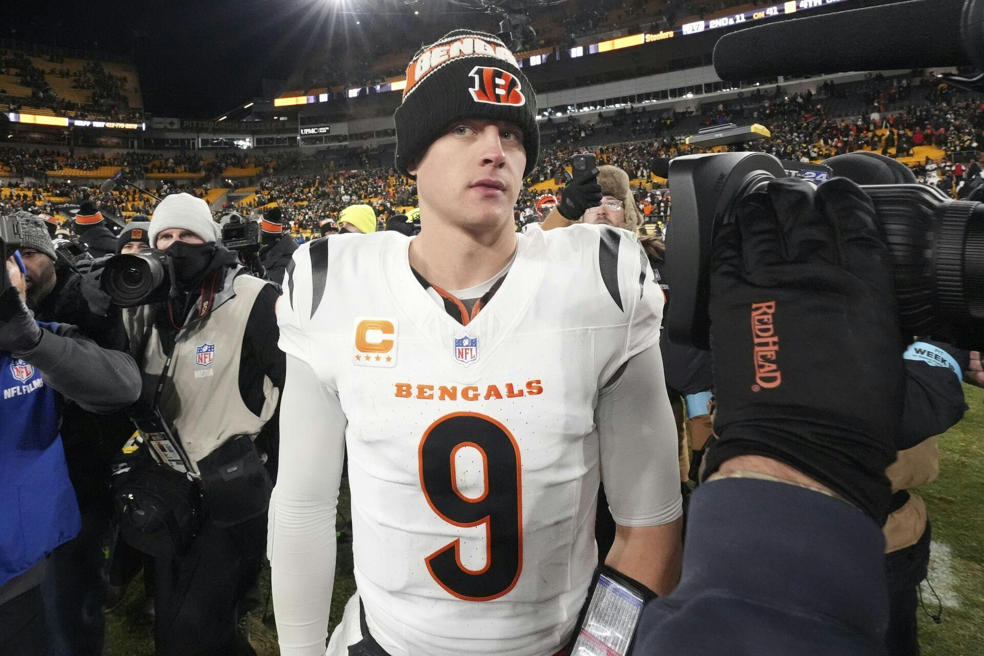 Cincinnati Bengals quarterback Joe Burrow (9) stands on the field following an NFL football game against the Pittsburgh Steelers in Pittsburgh, Jan. 4, 2025. (AP Photo/Gene J. Puskar)