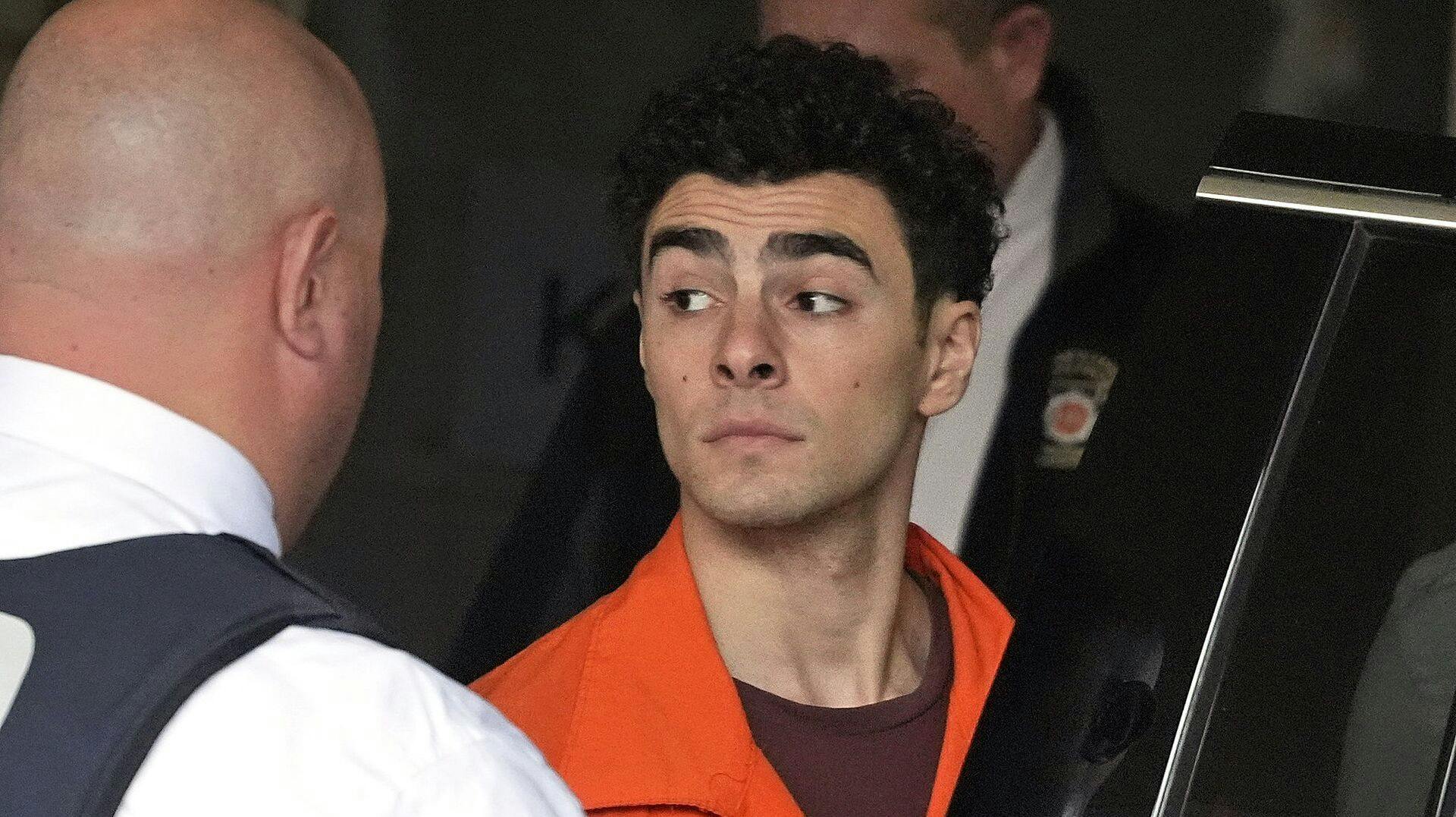 Luigi Nicholas Mangione leaves the Blair County Courthouse in Hollidaysburg, Pa., Thursday, Dec. 19, 2024. (AP Photo/Gene J. Puskar, Pool)