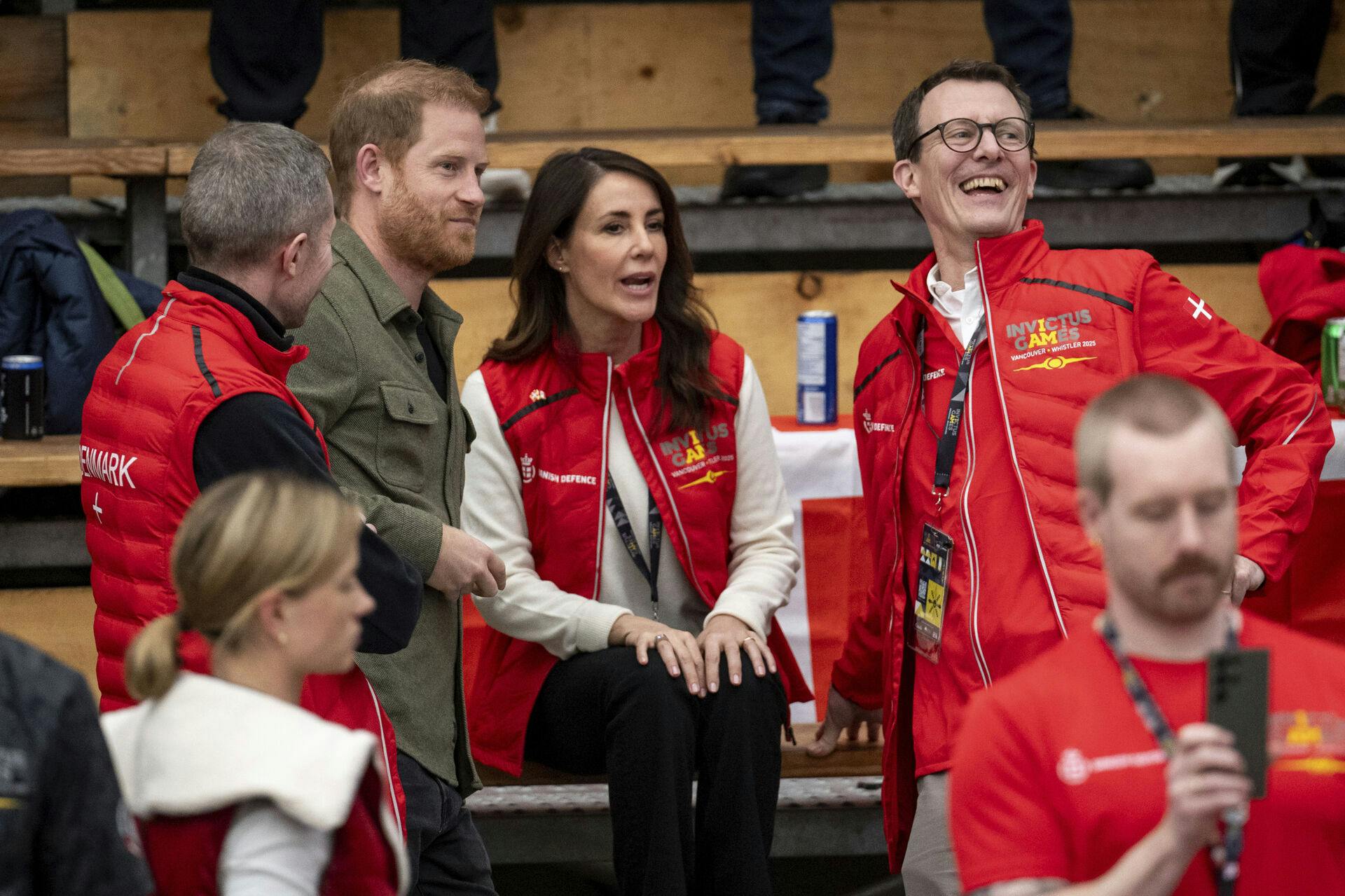 Prince Harry, the Duke of Sussex, meets with Denmark's Princess Marie and Prince Joachim during Sitting Volleyball at the 2025 Invictus Games, in Vancouver, on Saturday, Feb. 15, 2025. (Ethan Cairns/The Canadian Press via AP)