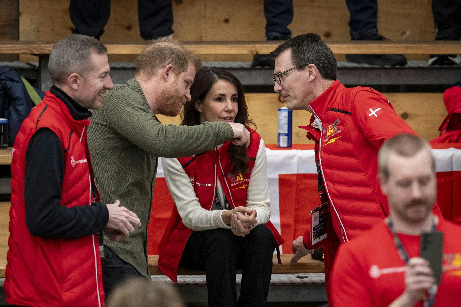 Prince Harry, the Duke of Sussex, meets with Denmark's Princess Marie and Prince Joachim during Sitting Volleyball at the 2025 Invictus Games, in Vancouver, on Saturday, Feb. 15, 2025. (Ethan Cairns/The Canadian Press via AP)