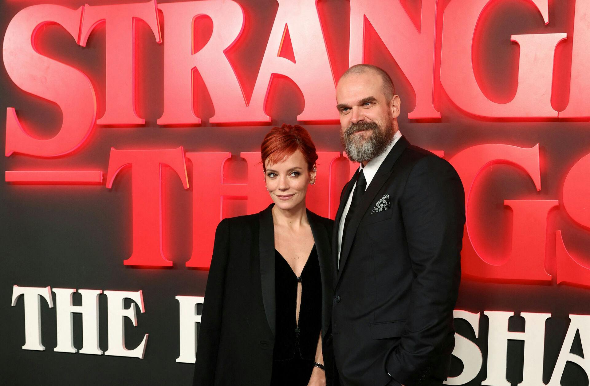 Actor David Harbour and singer Lily Allen attend the opening night for 'Stranger Things: The First Shadow' at Phoenix Theatre in London, Britain, December 14, 2023. REUTERS/Isabel Infantes