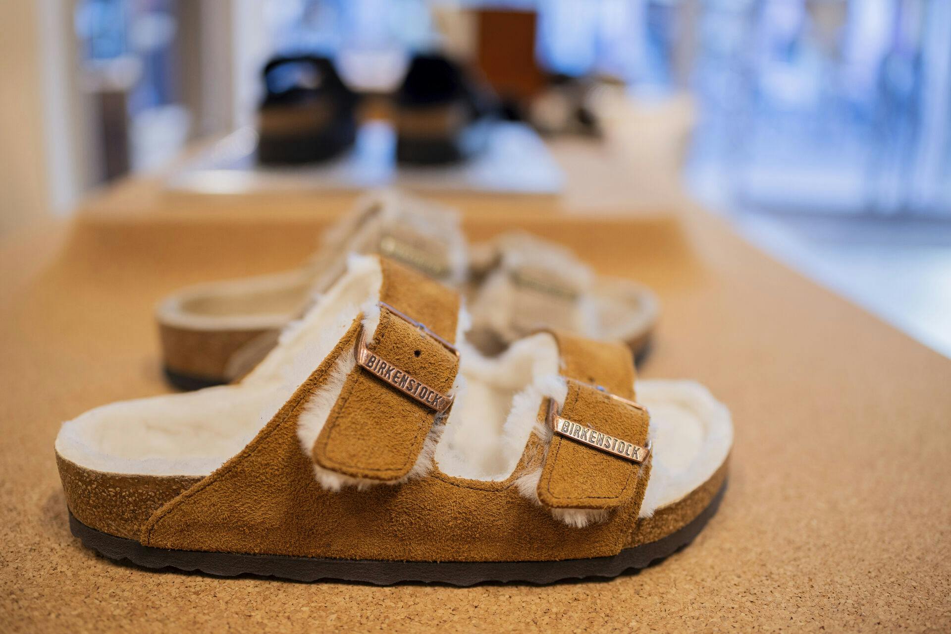 17 February 2025, North Rhine-Westphalia, Cologne: Various Birkenstock shoes are displayed on shelves in a Birkenstock store on Ehrenstra'e. Photo by: Rolf Vennenbernd/picture-alliance/dpa/AP Images