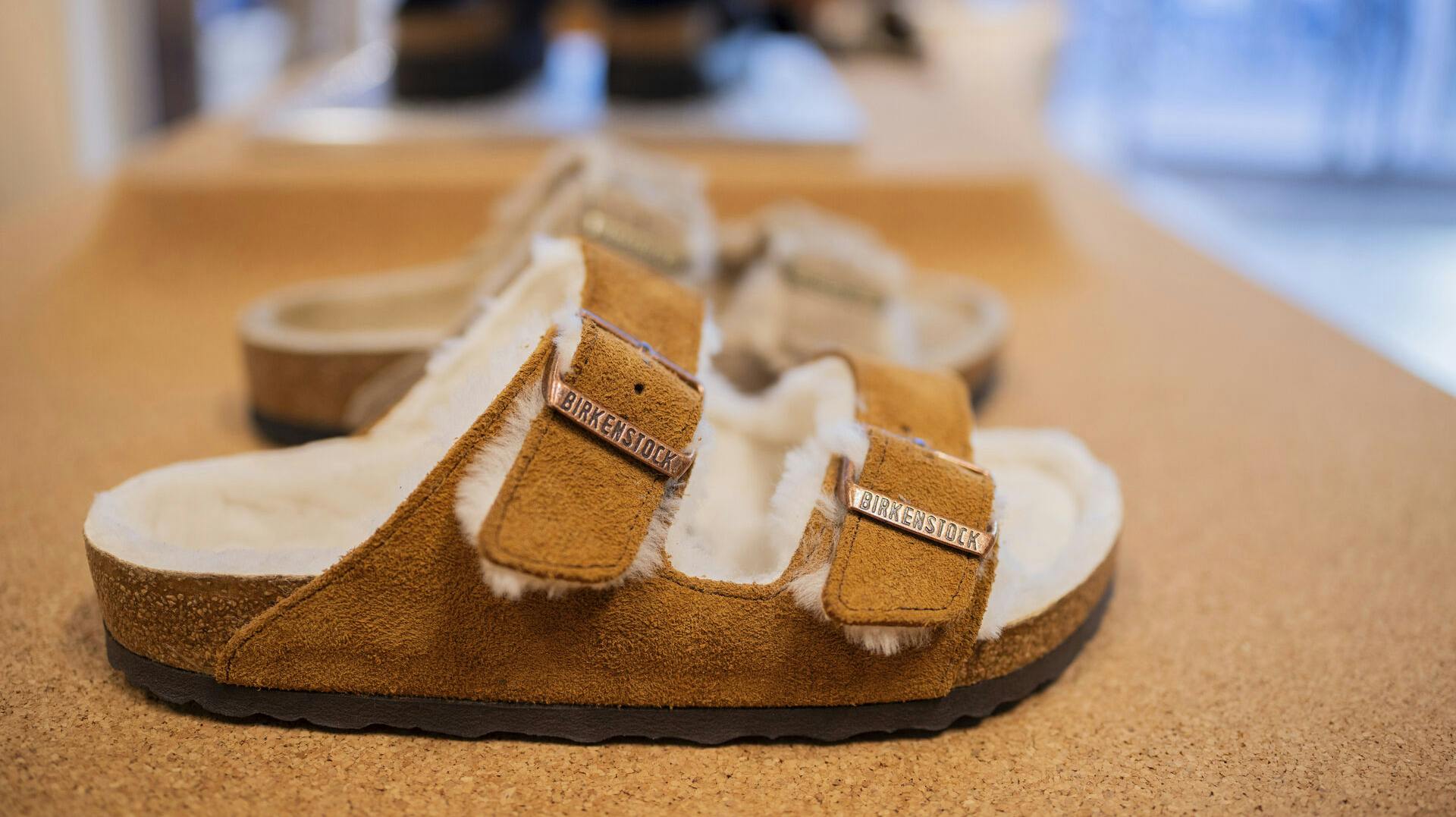 17 February 2025, North Rhine-Westphalia, Cologne: Various Birkenstock shoes are displayed on shelves in a Birkenstock store on Ehrenstra'e. Photo by: Rolf Vennenbernd/picture-alliance/dpa/AP Images