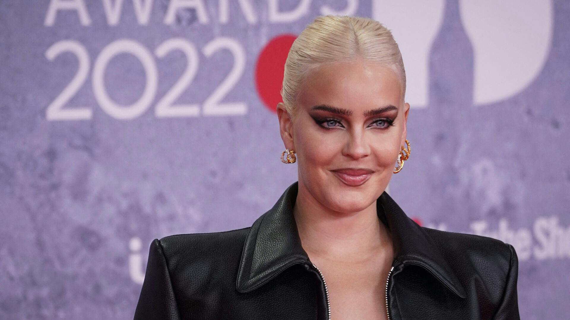 British singer Anne-Marie Rose Nicholson aka Anne-Marie poses on the red carpet upon her arrival for the BRIT Awards 2022 in London on February 8, 2022. Niklas HALLE'N / AFP