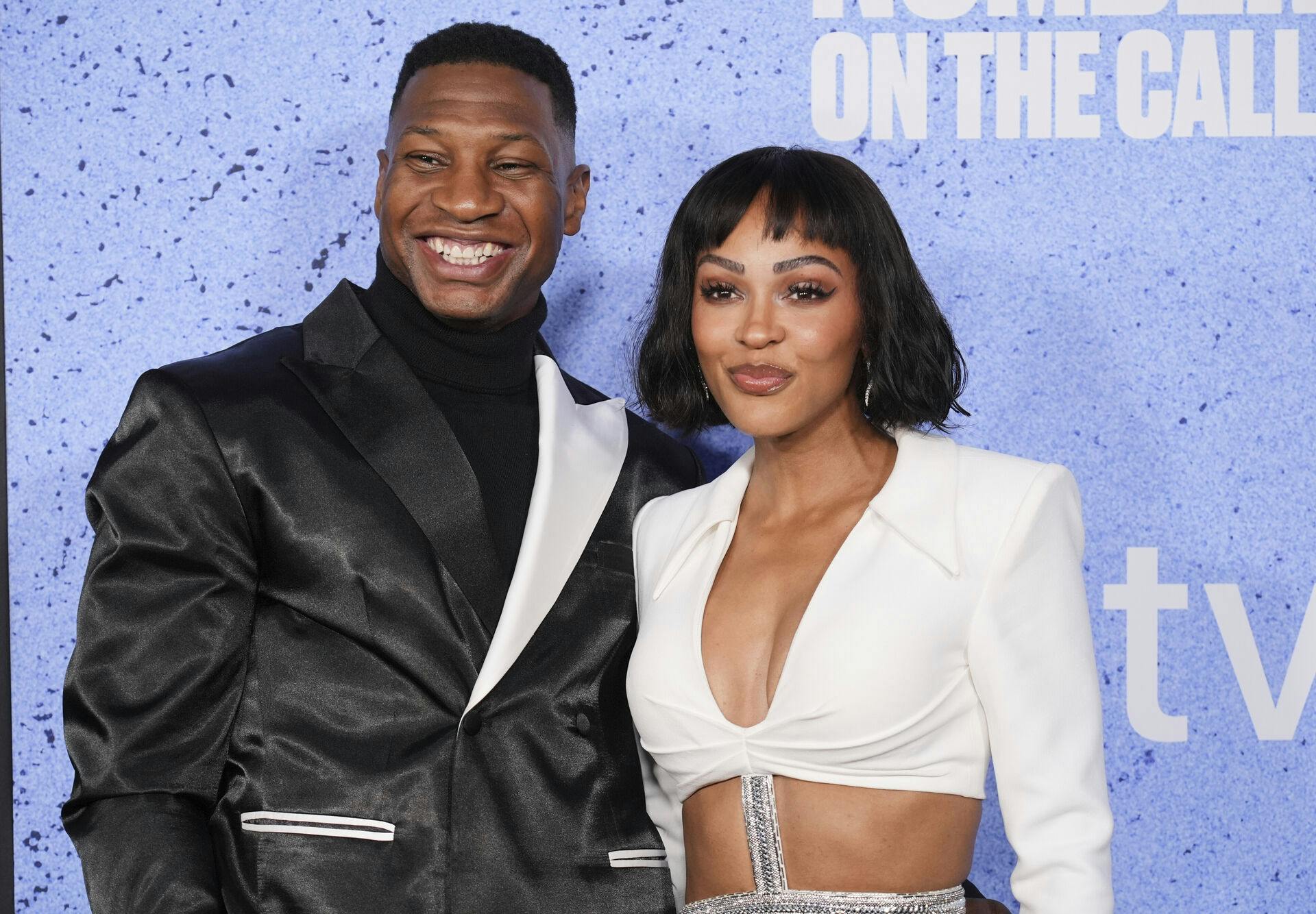 Actors Jonathan Majors, left, and Meagan Good pose together at the premiere of the documentary film "Number One on the Call Sheet" at the TCL Chinese Theatre on Wednesday, March 12, 2025, in Los Angeles. (AP Photo/Chris Pizzello)