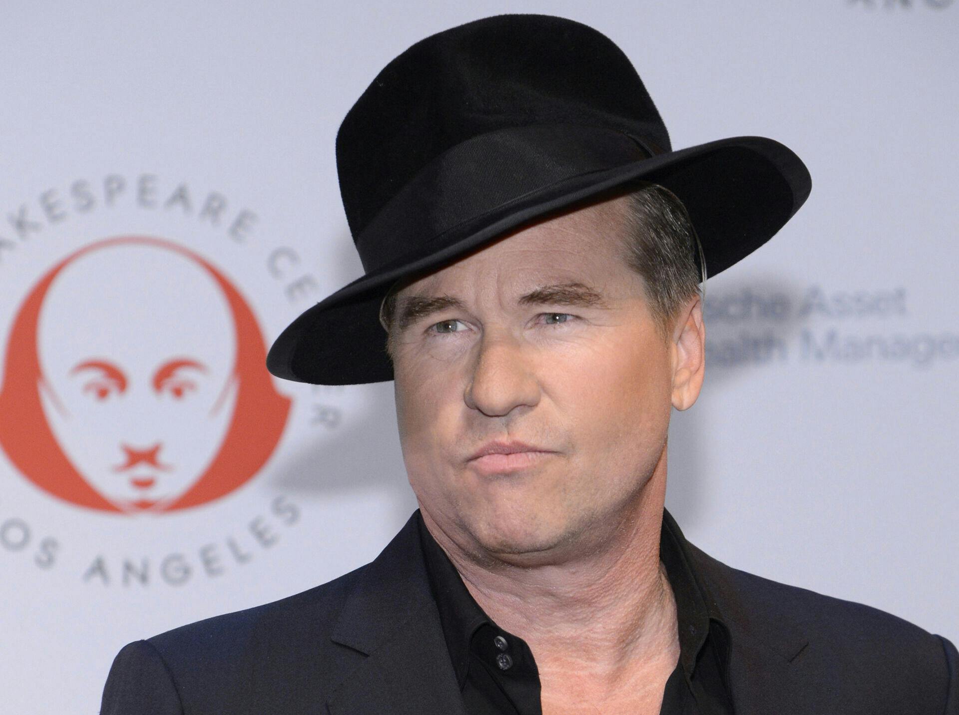 Actor Val Kilmer attends The Shakespeare Center of Los Angeles benefit reading of "The Two Gentlemen of Verona" in Santa Monica, California, in this file photo taken September 25, 2013. Kilmer, best known for his roles in "Batman Forever" and "The Doors" said January 31, 2105, he was at a Los Angeles hospital for observastion following wheat he called a "complication". REUTERS/Phil McCarten/Files (UNITED STATES - Tags: ENTERTAINMENT HEALTH)