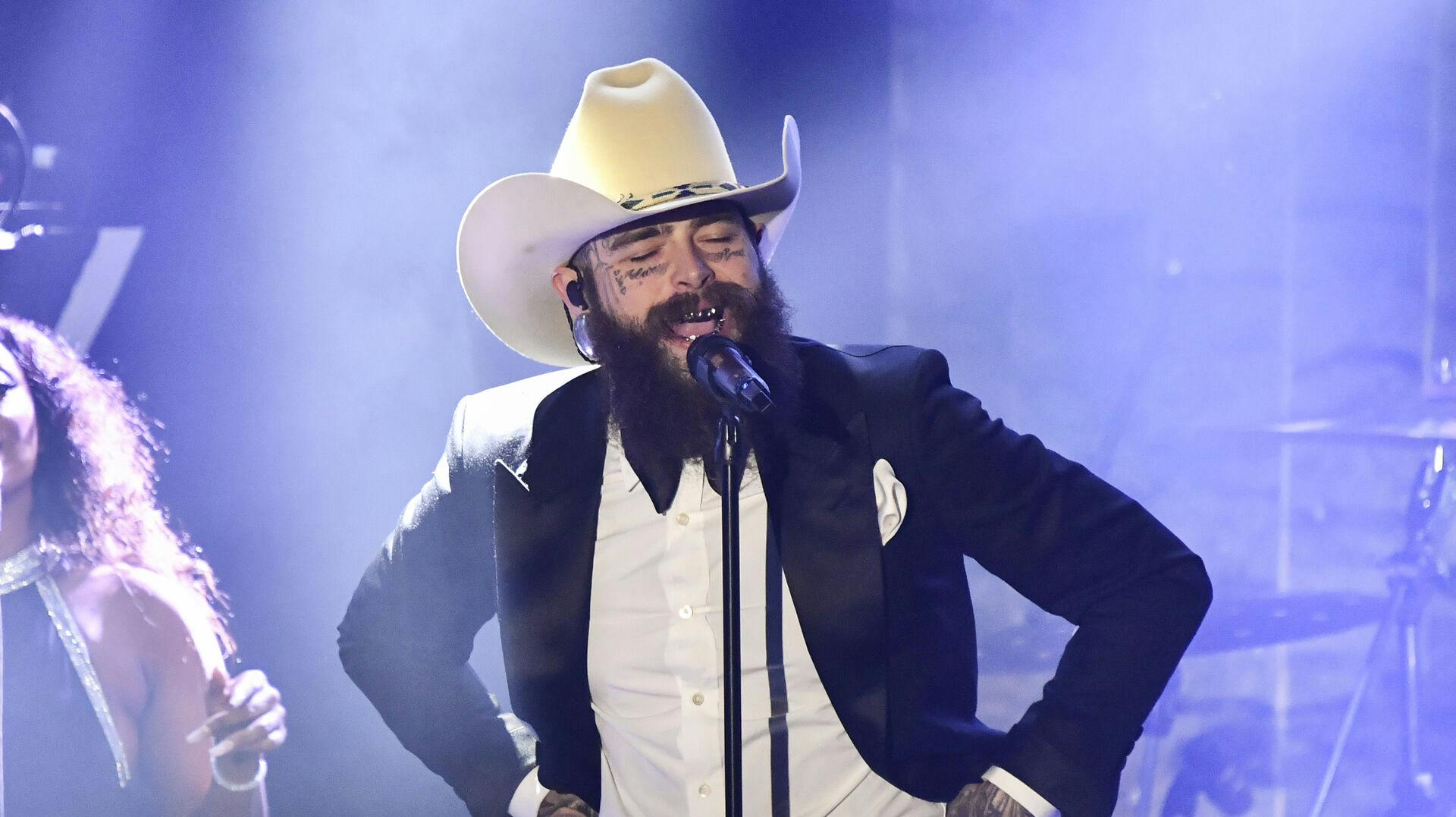 Post Malone performs during the Pre-Grammy Gala on Saturday, Feb. 1, 2025, at the Beverly Hilton Hotel in Beverly Hills, Calif. (Photo by Richard Shotwell/Invision/AP)