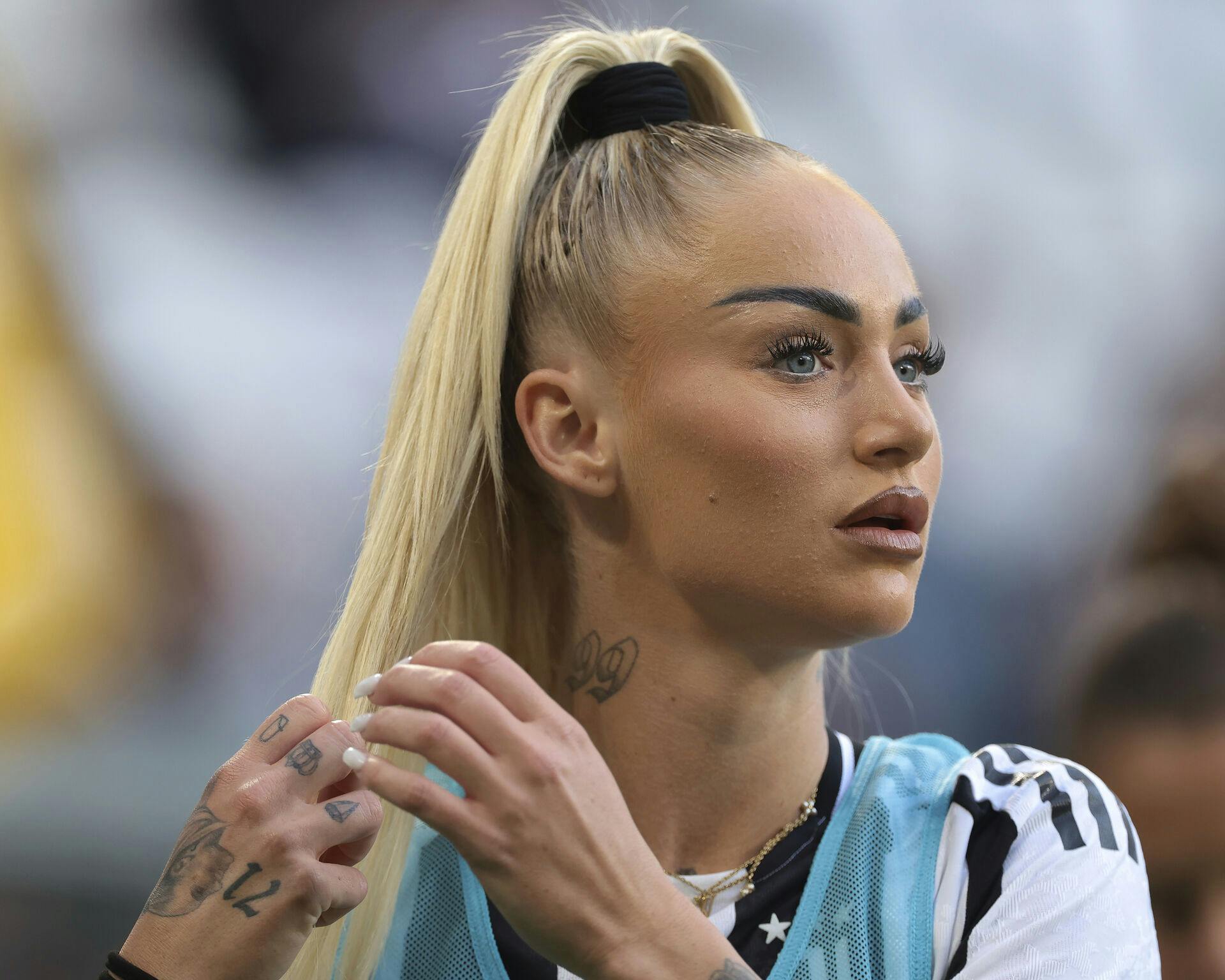 October 13, 2024, Turin: Turin, Italy, 13th October 2024. Alisha Lehmann of Juventus adjusts her hair as she warms up during the Serie A Femminile match at Allianz Stadium, Turin. (Credit Image: Â© Jonathan Moscrop/Sportimage/Cal Sport Media) (Cal Sport Media via AP Images)