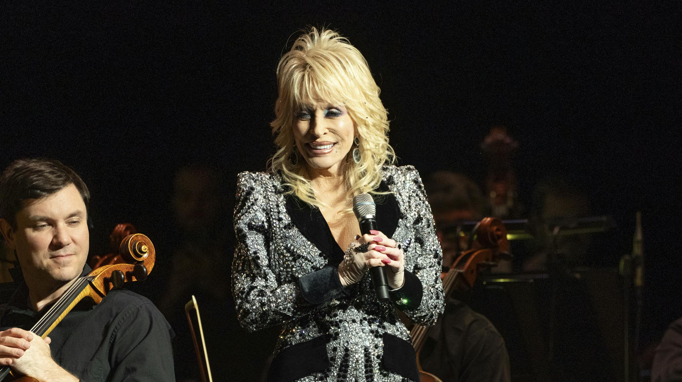 Dolly Parton performs during for "Threads: My Songs in Symphony" on Thursday, March 20, 2025, in Nashville, Tenn. (Photo by Amy Harris/Invision/AP)