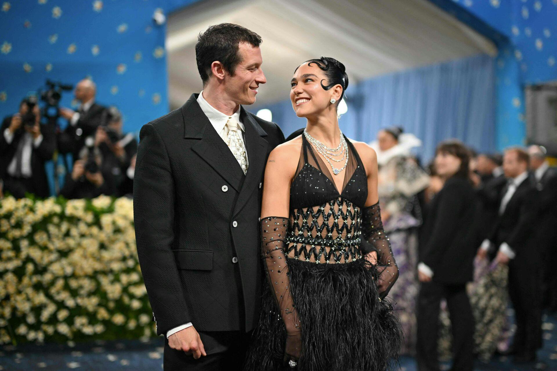 British-Albanian singer-songwriter Dua Lipa (R) and British actor Callum Turner arrive for the 2025 Met Gala at the Metropolitan Museum of Art on May 5, 2025, in New York. The Gala raises money for the Metropolitan Museum of Art's Costume Institute. The 2025 Met Gala is themed "Tailored for You, " aligning with the Costume Institute's exhibition, "Superfine: Tailoring Black Style, " set to open to the public on May 10. (Photo by ANGELA WEISS / AFP)