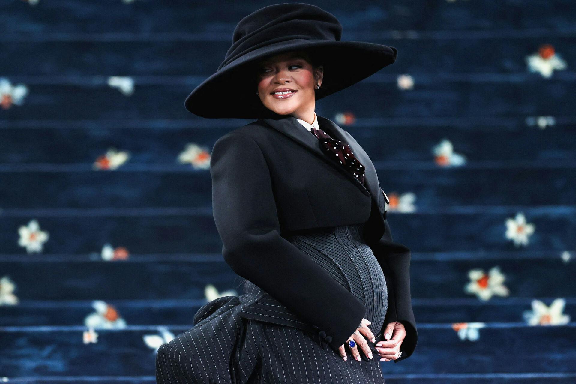 Rihanna poses during the Met Gala, an annual fundraising gala held for the benefit of the Metropolitan Museum of Art's Costume Institute with this year's theme 'Superfine: Tailoring Black Style, ' in New York City, New York, U.S., May 5, 2025. REUTERS/Jeenah Moon