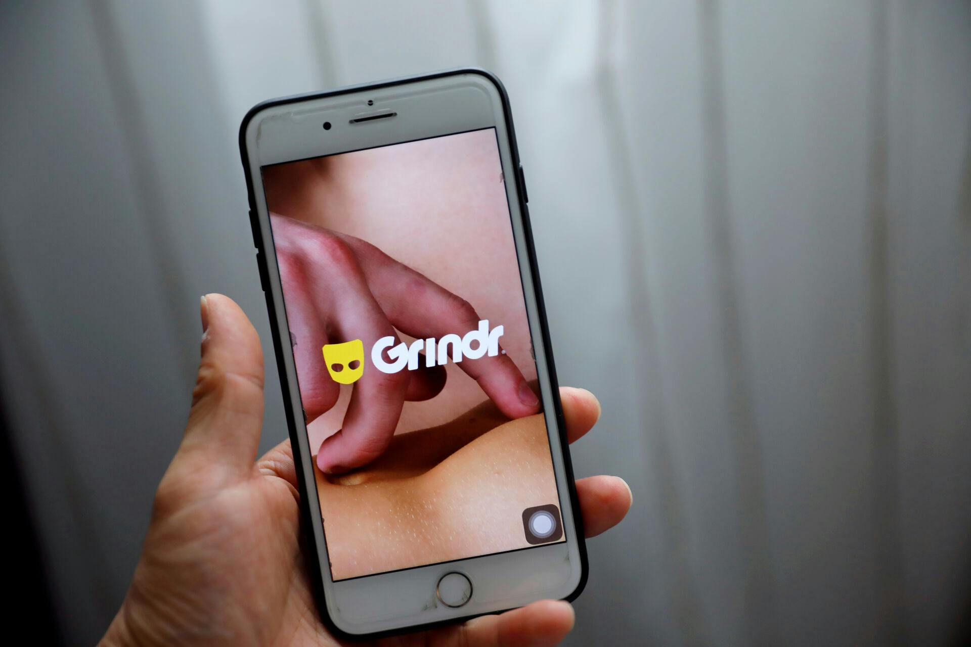 FILE PHOTO: Grindr app is seen on a mobile phone in this photo illustration taken in Shanghai, China March 28, 2019. REUTERS/Aly Song/File Photo