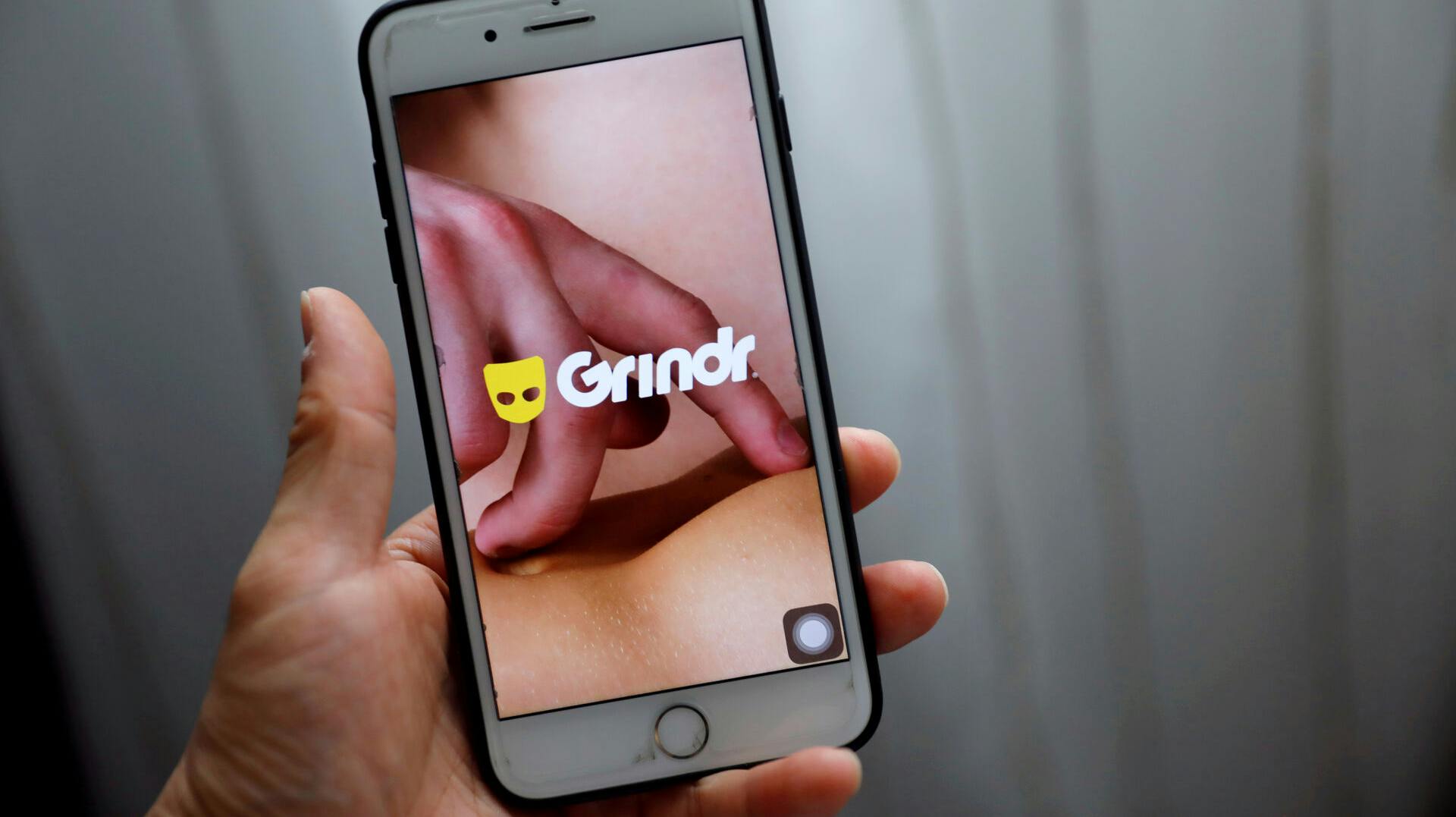 FILE PHOTO: Grindr app is seen on a mobile phone in this photo illustration taken in Shanghai, China March 28, 2019. REUTERS/Aly Song/File Photo