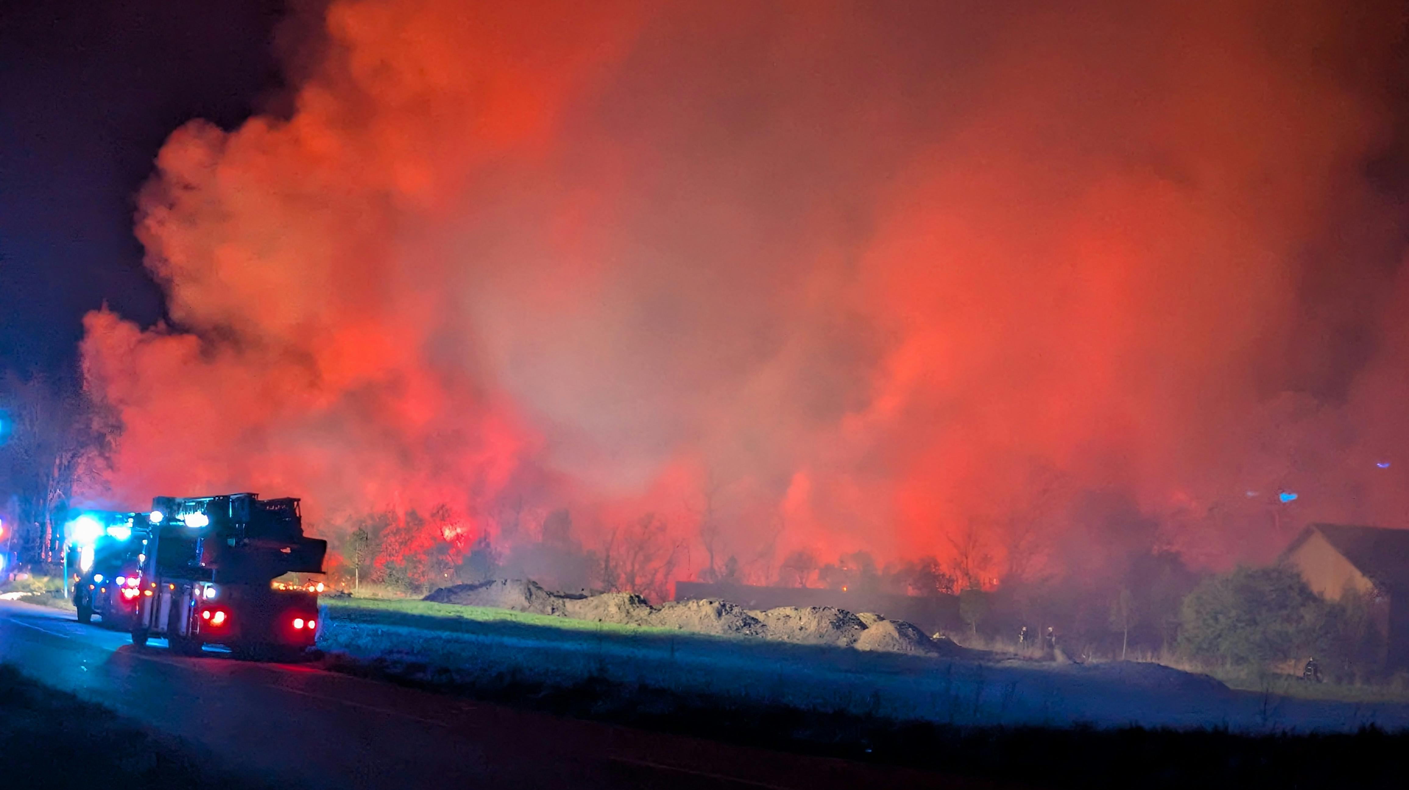 Politiet har anholdt og sigtet to mænd for at have brændt en gård ned.