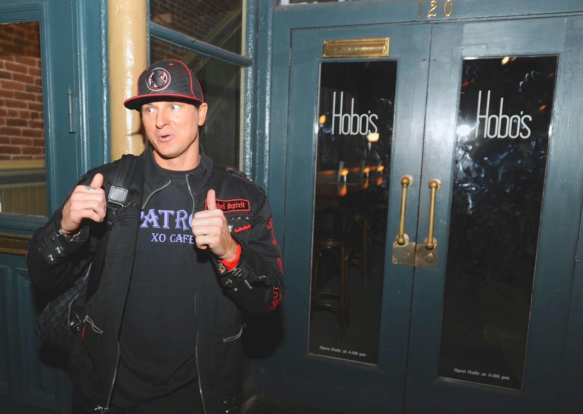 Celebrity ghost hunter, Zak Bagans, lead investigator on "Ghost Adventurers", third from left, poses outside Hobos bar during Patron XO Cafe's "Hunt for Haunted America" above the Shanghai Tunnels in Portland, Ore., Tuesday Oct., 23, 2012. (Photo by Greg Wahl-Stephens/AP Images for Patron Spirits)