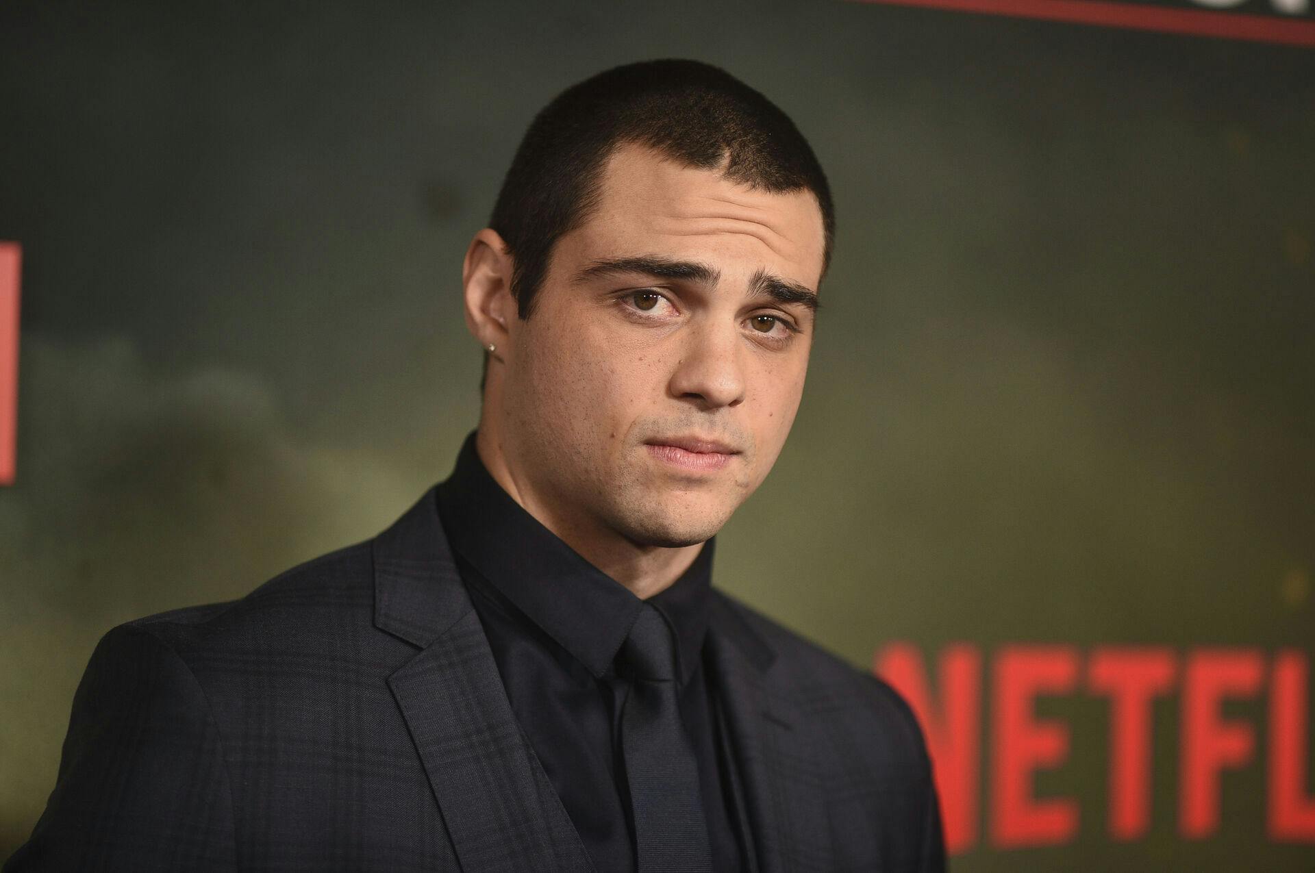 Noah Centineo arrives at the world premiere of "The Recruit" on Thursday, Dec. 8, 2022, at AMC The Grove 14 in Los Angeles. (Photo by Richard Shotwell/Invision/AP)