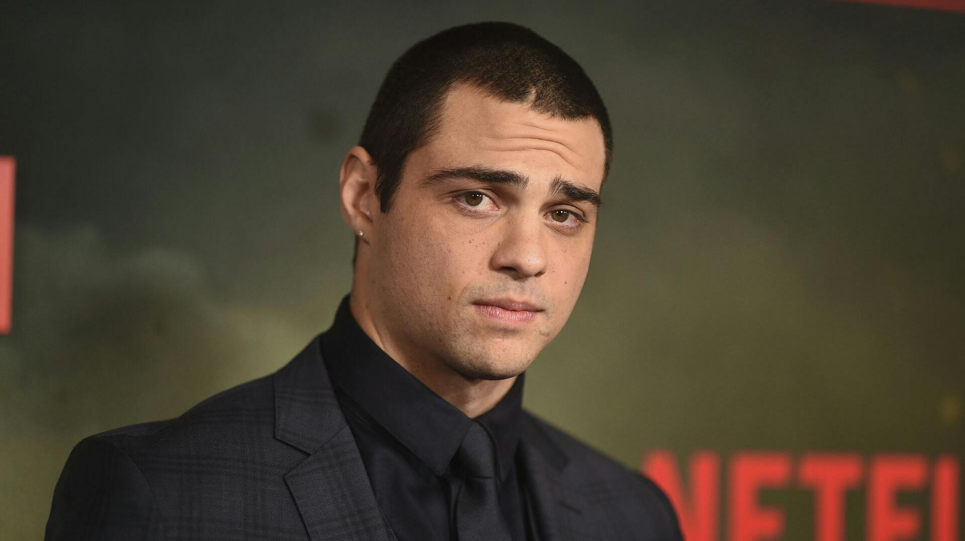 Noah Centineo arrives at the world premiere of "The Recruit" on Thursday, Dec. 8, 2022, at AMC The Grove 14 in Los Angeles. (Photo by Richard Shotwell/Invision/AP)