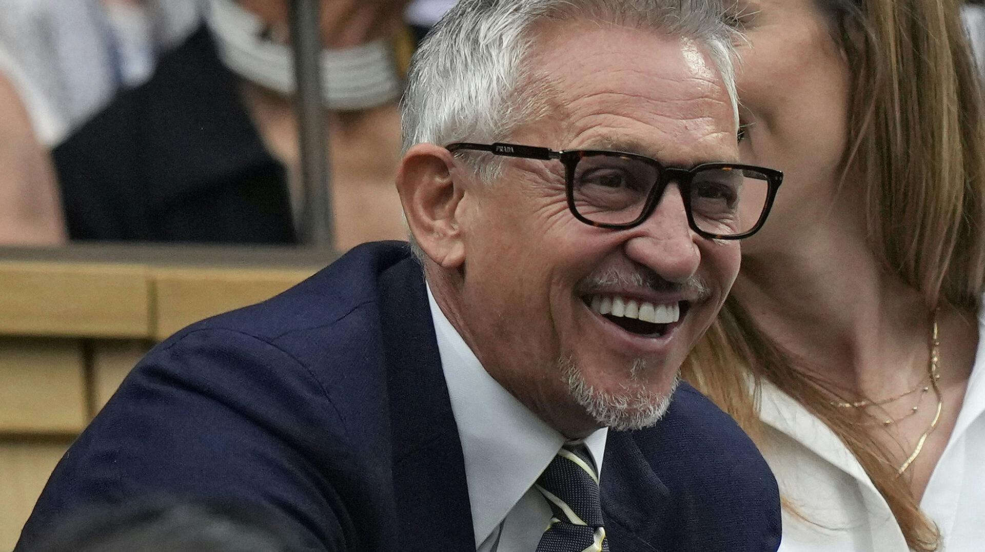 FILE - Gary Lineker, sports broadcaster and former England soccer player smiles as he takes his seat in the Royal Box on Centre Court on day six of the Wimbledon tennis championships in London, Saturday, July 8, 2023. (AP Photo/Alastair Grant, File)