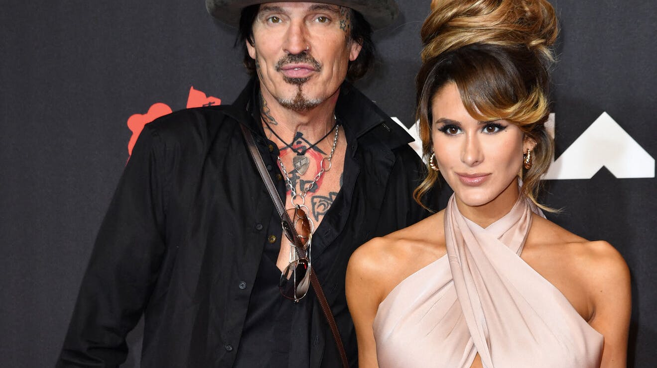 US musician Tommy Lee and Brittany US internet personality Brittany Furlan arrive for the 2021 MTV Video Music Awards at Barclays Center in Brooklyn, New York, September 12, 2021. ANGELA WEISS / AFP