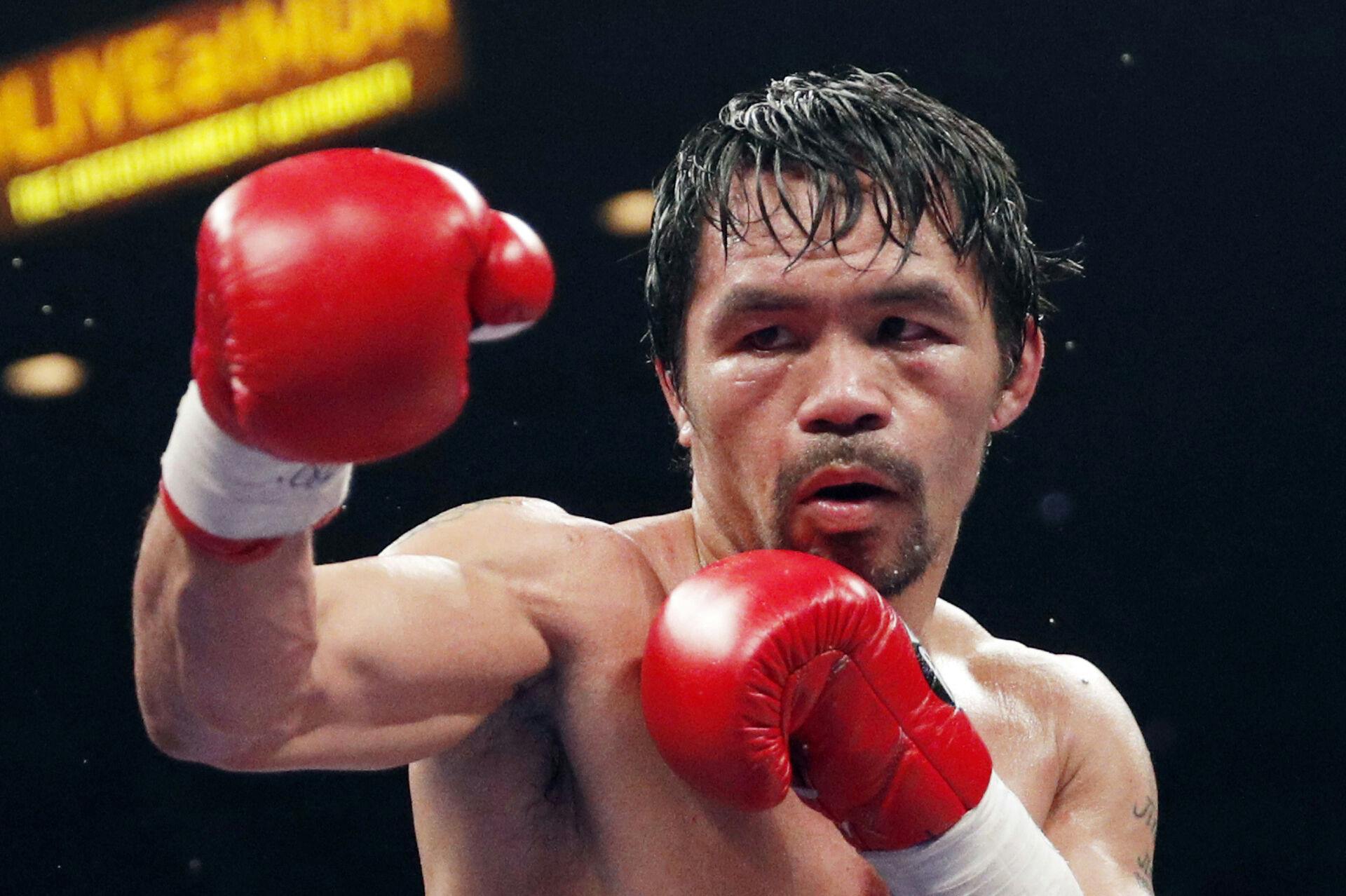 Manny Pacquiao skal atter i trække i boksehanskerne.