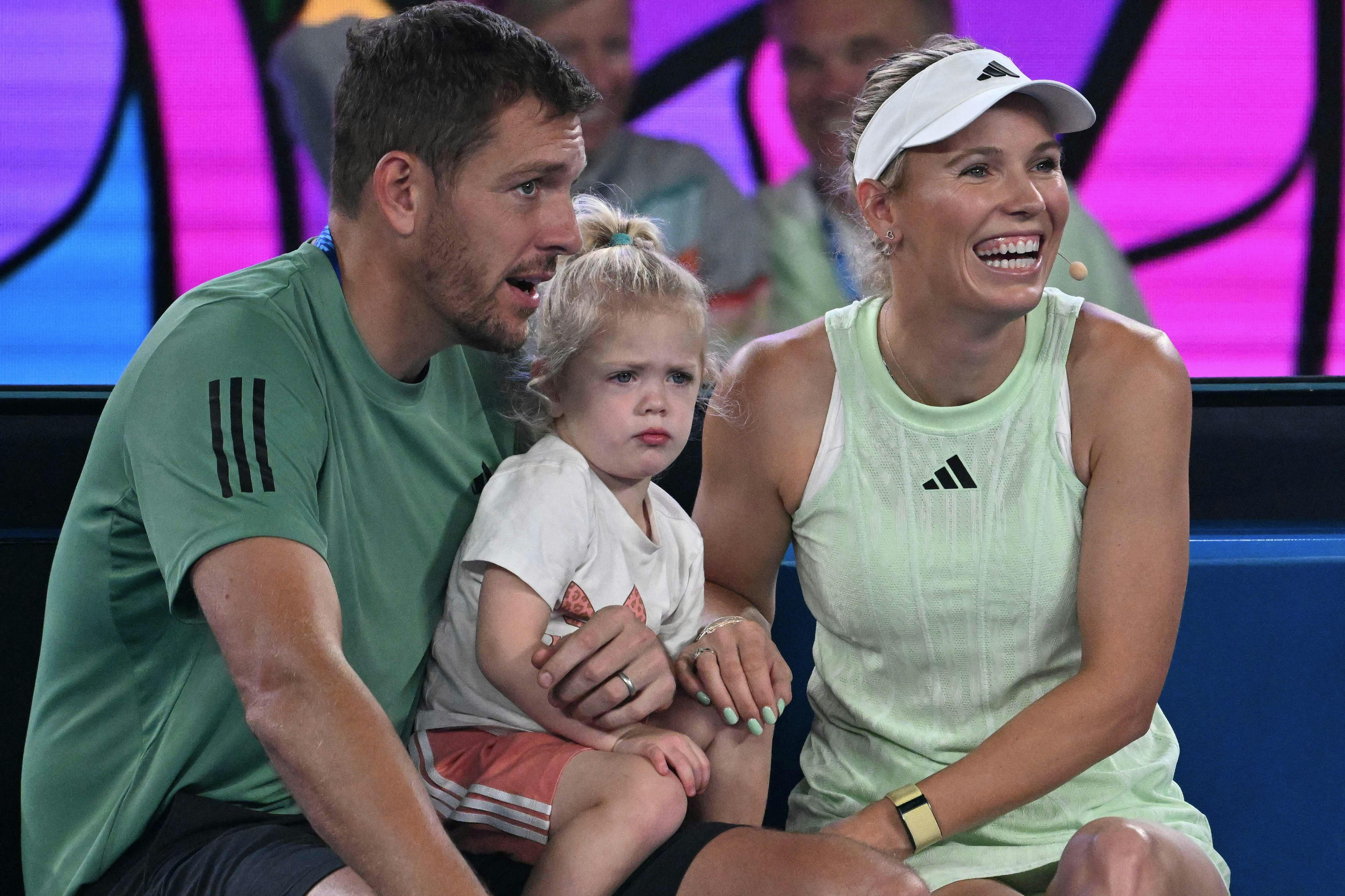 Denmark's Caroline Wozniacki attends a kids day event with her daughter and husband David Lee in Melbourne on January 13, 2024 ahead of the Australian Open tennis championship starting on January 14. (Photo by WILLIAM WEST / AFP) / -- IMAGE RESTRICTED TO EDITORIAL USE - STRICTLY NO COMMERCIAL USE --