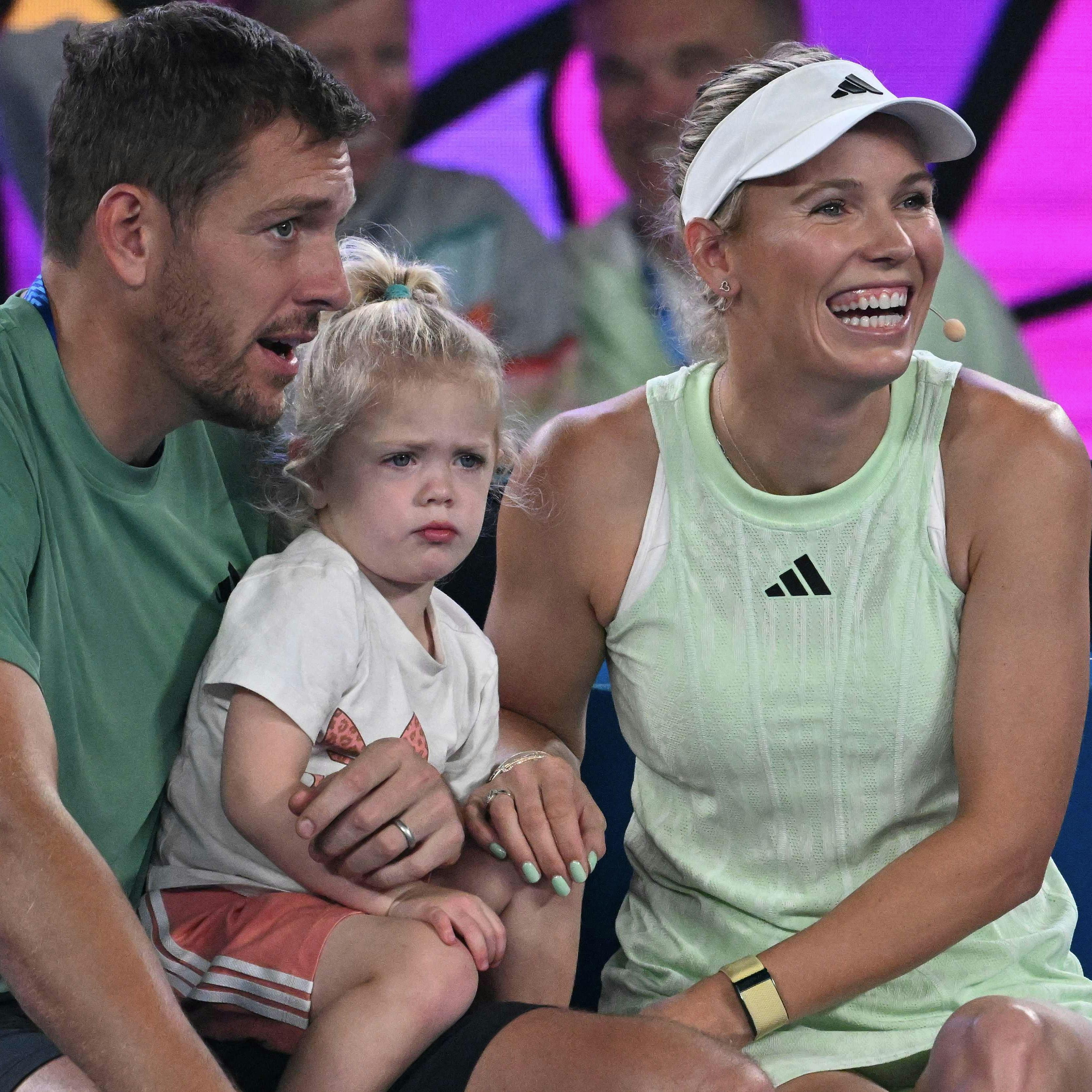 Denmark's Caroline Wozniacki attends a kids day event with her daughter and husband David Lee in Melbourne on January 13, 2024 ahead of the Australian Open tennis championship starting on January 14. (Photo by WILLIAM WEST / AFP) / -- IMAGE RESTRICTED TO EDITORIAL USE - STRICTLY NO COMMERCIAL USE --
