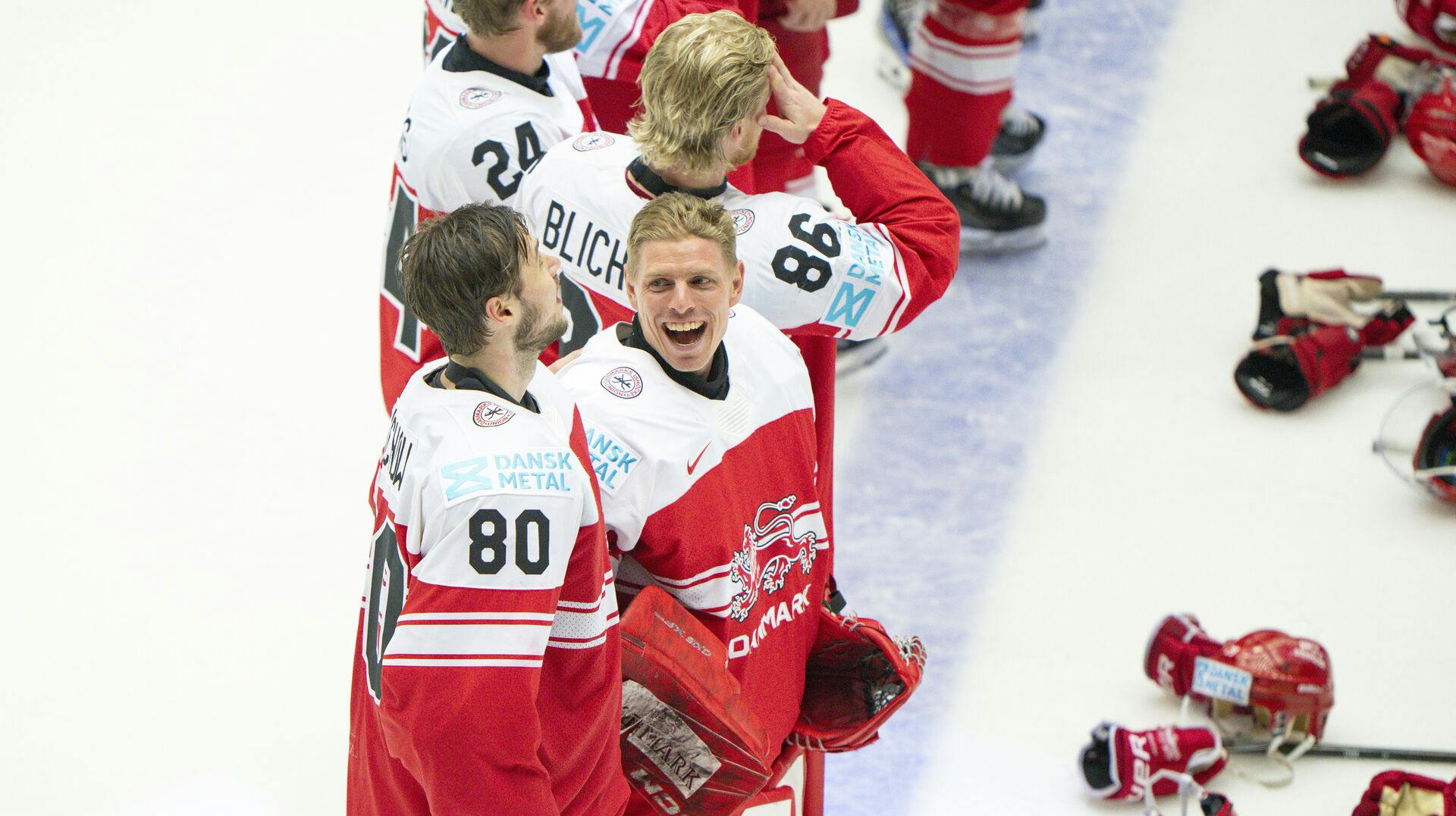 Goalkeeper Sebastian Dahm, Denmark and goalkeeper Frederik Dichow celebrate after the quarter-final match between Canada and Denmark at the IIHF Ice Hockey World Championships in Herning, Denmark, Thursday May 22, 2025.. (Foto: Bo Amstrup/Ritzau Scanpix)