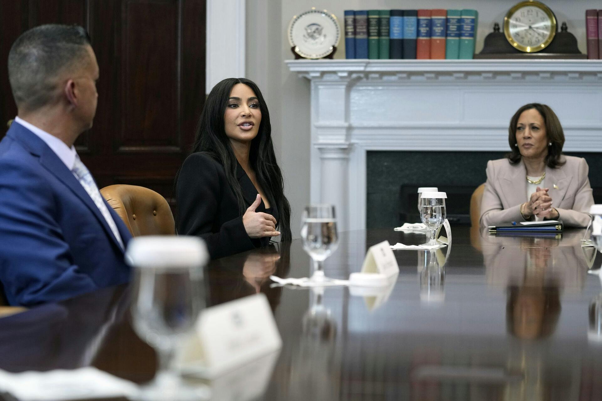 Vice President Kamala Harris, from right, listens as Kim Kardashian speaks during a discussion in the Roosevelt Room of the White House in Washington, Thursday, April 25, 2024, on criminal justice reform and the pardons issued by President Joe Biden earlier this month. (AP Photo/Susan Walsh)