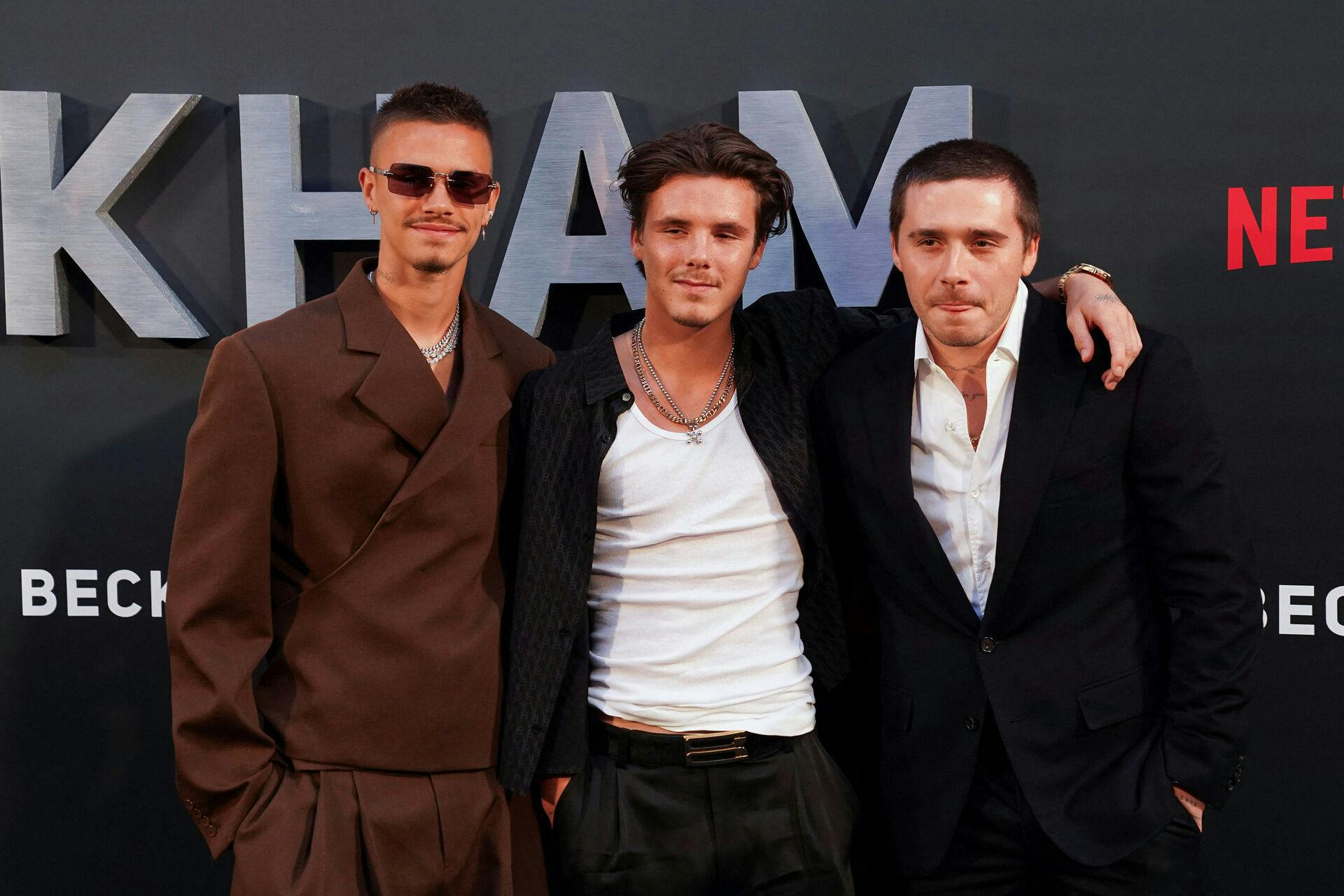 David Beckham's sons Brooklyn Peltz Beckham, Cruz Beckham and Romeo Beckham arrive to the premiere of a Netflix documentary called 'Beckham' in London, Britain October 3, 2023. REUTERS/Maja Smiejkowska
