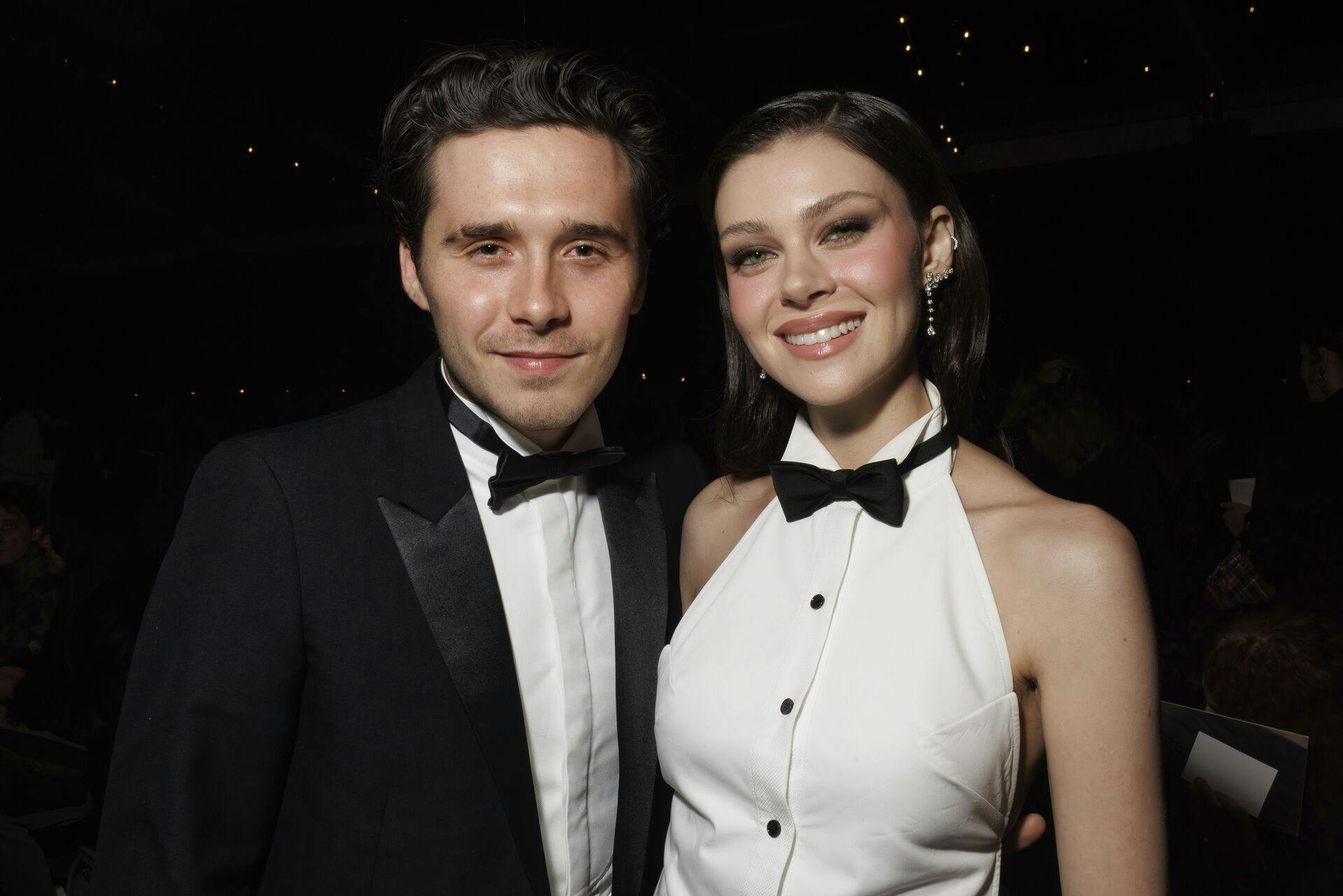 Brooklyn Beckham, left, and Nicola Peltz attend the Victoria Beckham Spring/Summer 2025 collection presented Friday, Sept. 27, 2024, in Paris. (Photo by Vianney Le Caer/Invision/AP)
