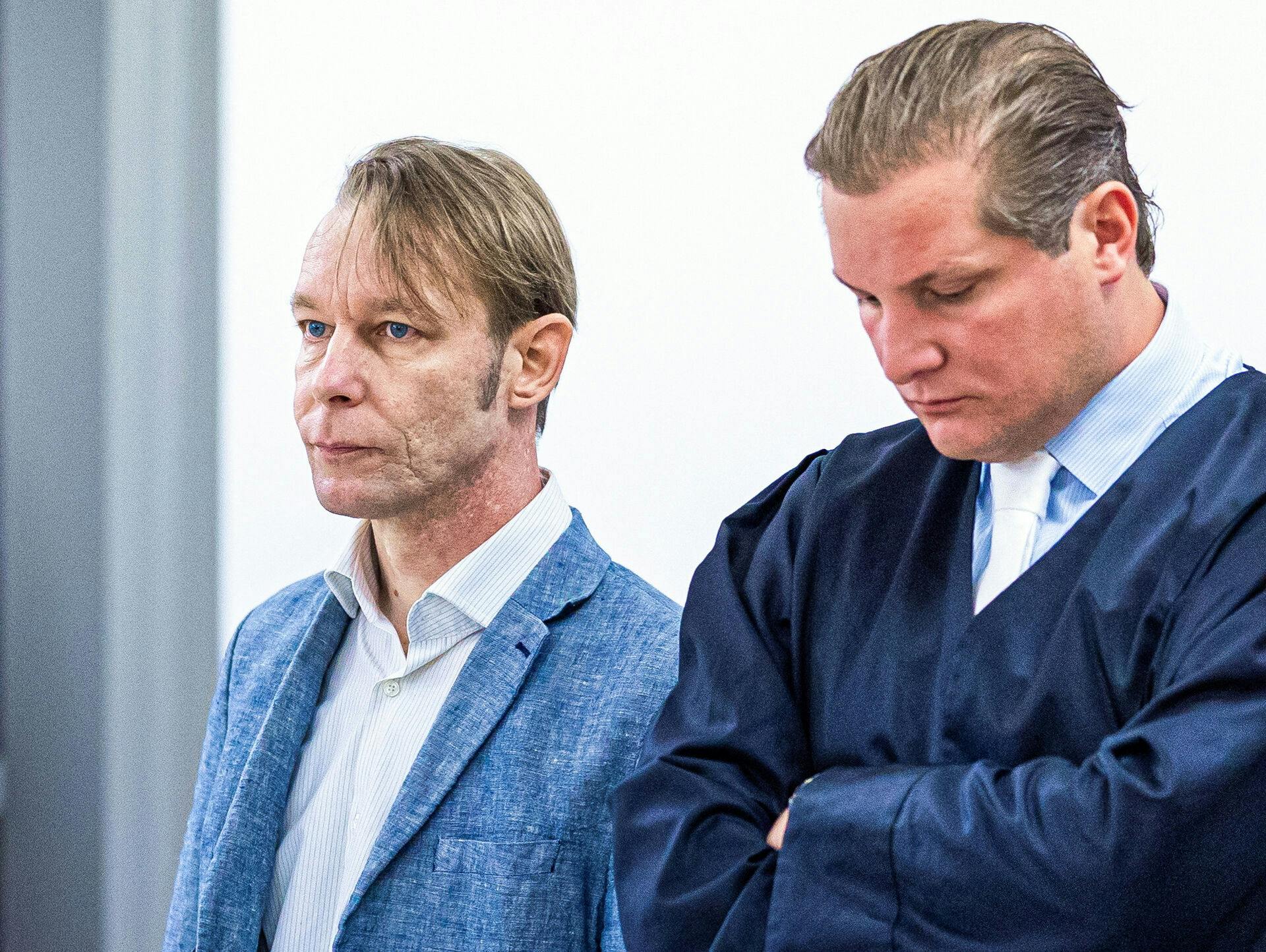 A man, who is a suspect in the disappearance of British toddler Madeleine McCann in Portugal, stands next to his lawyer Friedrich Fuelscher at his trial on unrelated sexual assault charges in Braunschweig, Germany, October 2, 2024. Christian B., is charged with three counts of aggravated rape and two counts of sexual abuse of children in Portugal between June 2007 and December 2000. Moritz Frankenberg/Pool via REUTERS