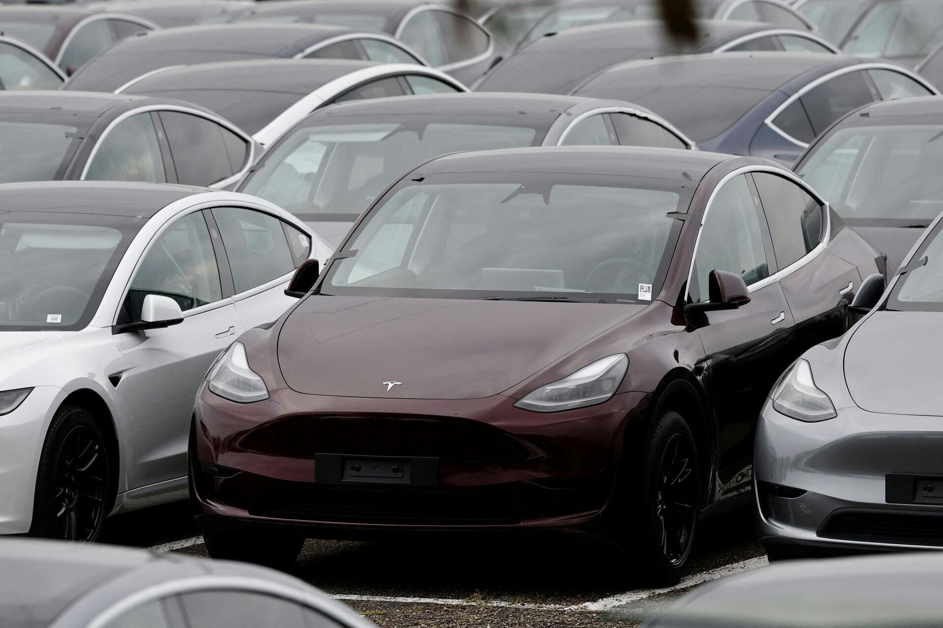 Tesla electric vehicles are pictured at one of the company's delivery centers in Valenton, near Paris, France, April 24, 2025. REUTERS/Benoit Tessier