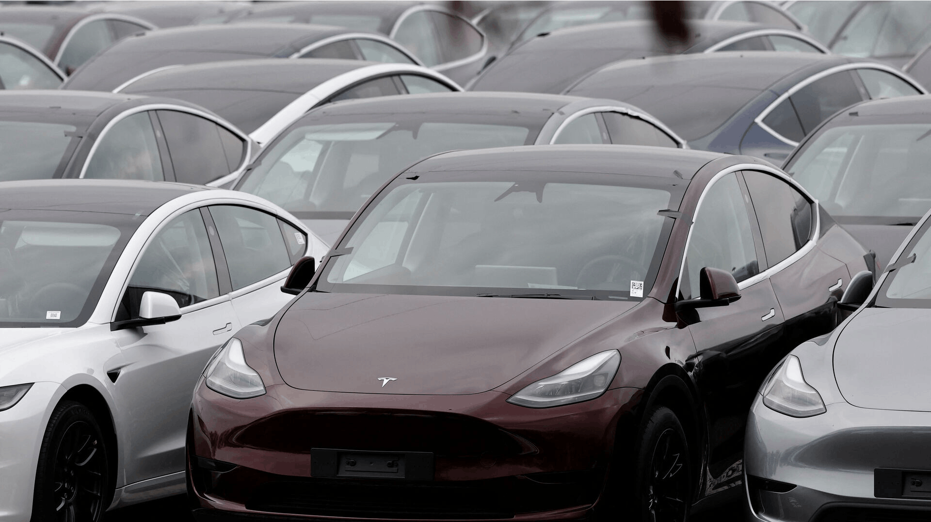 Tesla electric vehicles are pictured at one of the company's delivery centers in Valenton, near Paris, France, April 24, 2025. REUTERS/Benoit Tessier