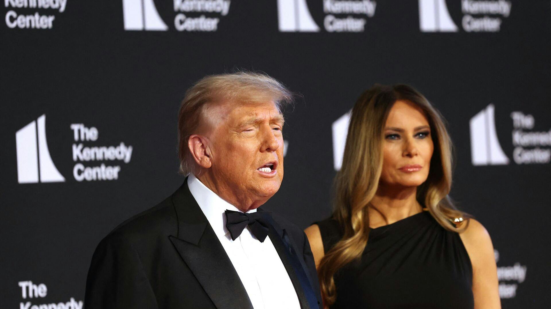 US President Donald Trump (L) and First Lady Melania Trump arrive to attend the opening night of "Les Miserables" at the Kennedy Center in Washington, DC, on June 11, 2025. (Photo by alex wroblewski / AFP)