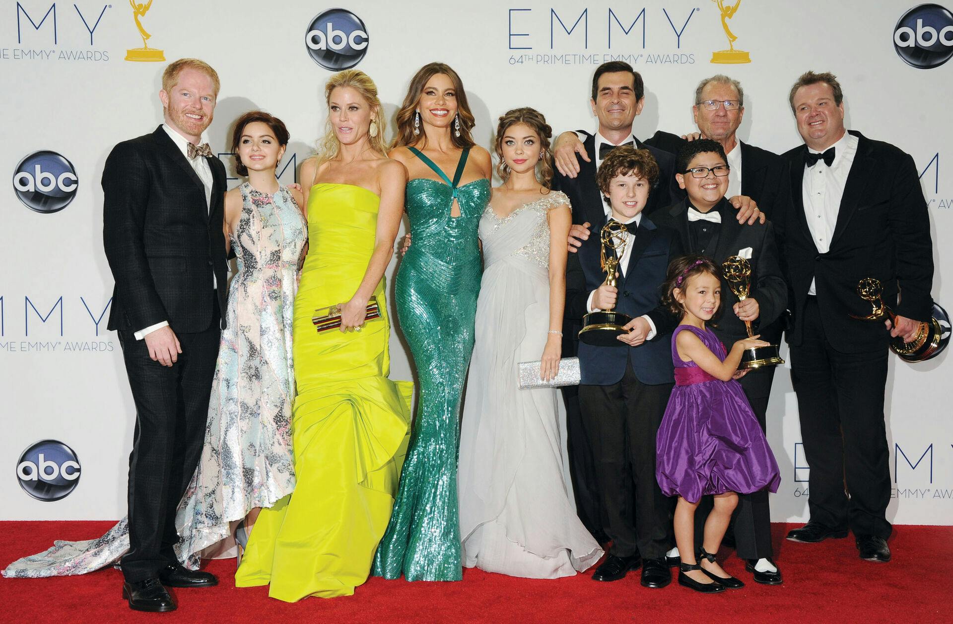 Jesse Tyler Fergusen, from left, Ariel Winter, Julie Bowen, Sofia Vergara, Sarah Hyland, Ty Burrell, Nolan Gould, Ed O'Neill, Rico Rodridgez, Eric Stonestreet, Aubrey Anderson-Emmons poses for a photo at The 64th Annual Primetime Emmy Awards Winners Walk, Sunday, September 23, 2012, at LA Live, in Los Angeles.64th Primetime Emmy® Awards air live coast-to-coast on Sunday, September 23rd on ABC from the Nokia Theatre L.A. LIVE in Los Angeles. (AP Photo/Katy Winn)