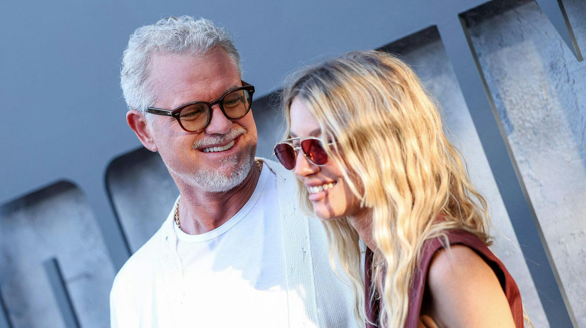 US actor Eric Dane and filmmaker Janell Shirtcliff attend Prime Video's "Countdown" premiere at the Harmony Gold theatre in Los Angeles on June 18, 2025. (Photo by VALERIE MACON / AFP)