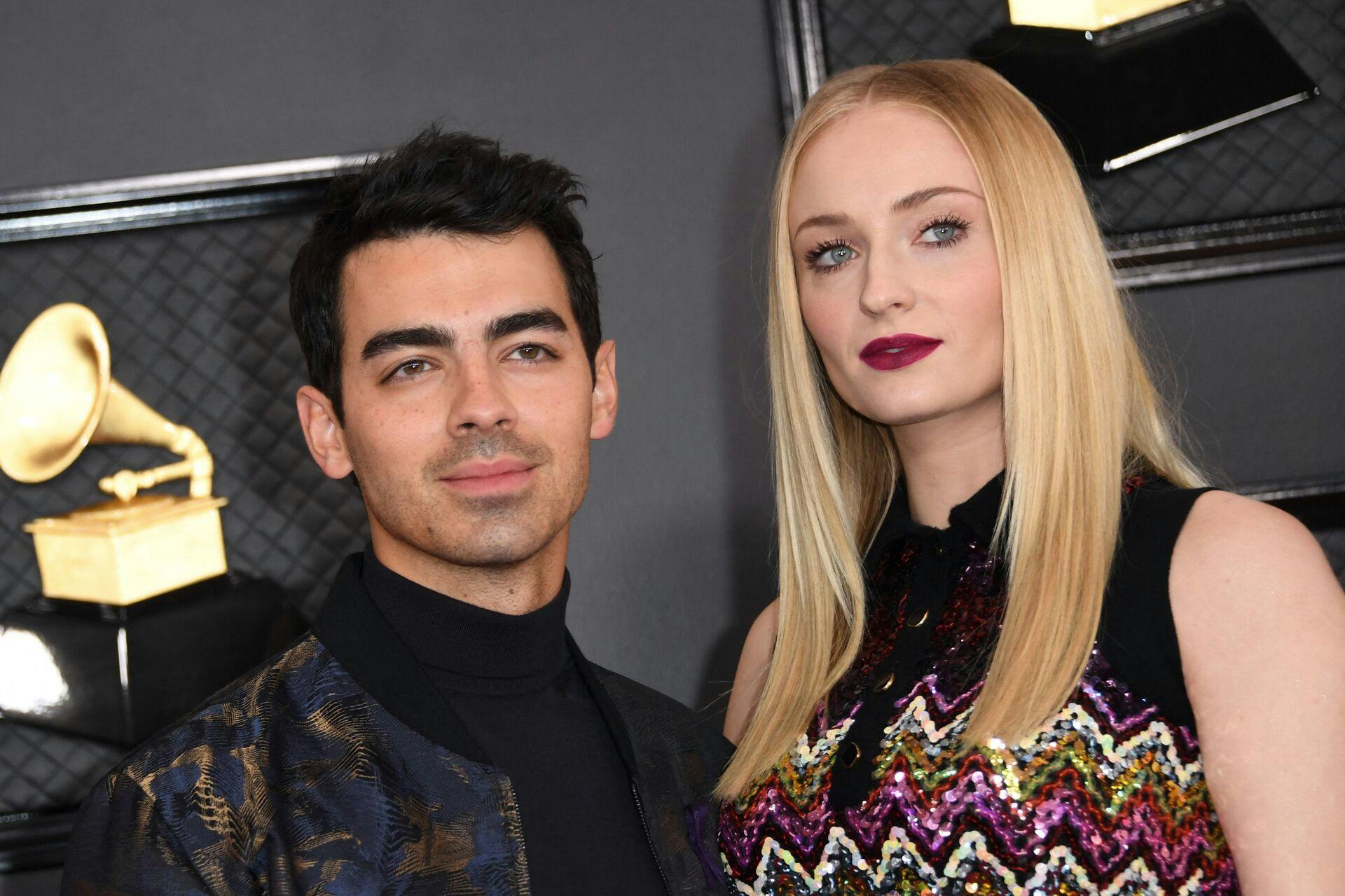(FILES) British actress Sophie Turner and her husband US singer Joe Jonas arrives for the 62nd Annual Grammy Awards on January 26, 2020, in Los Angeles. Sepember 5, 2023, Joe Jonas files for divorce from Sophie Turner after 4 years of marriage, the couple have two daughters. (Photo by VALERIE MACON / AFP)