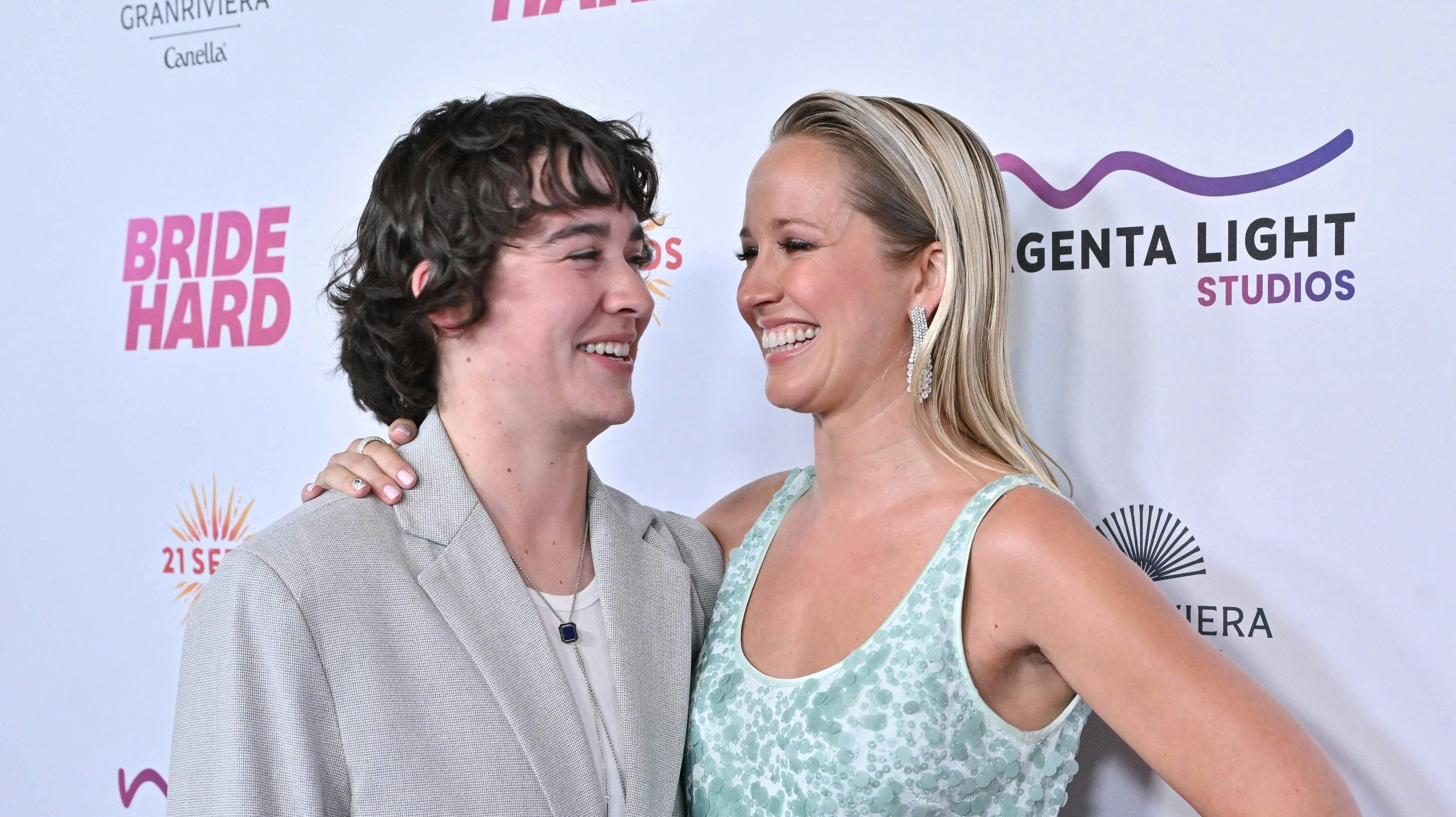 US actress Anna Camp (R) and her girlfriend stylist Jade Whipkey attend "Bride Hard" premiere at the Directors Guild of America (DGA) theatre in Los Angeles on June 18, 2025. (Photo by LISA O'CONNOR / AFP)
