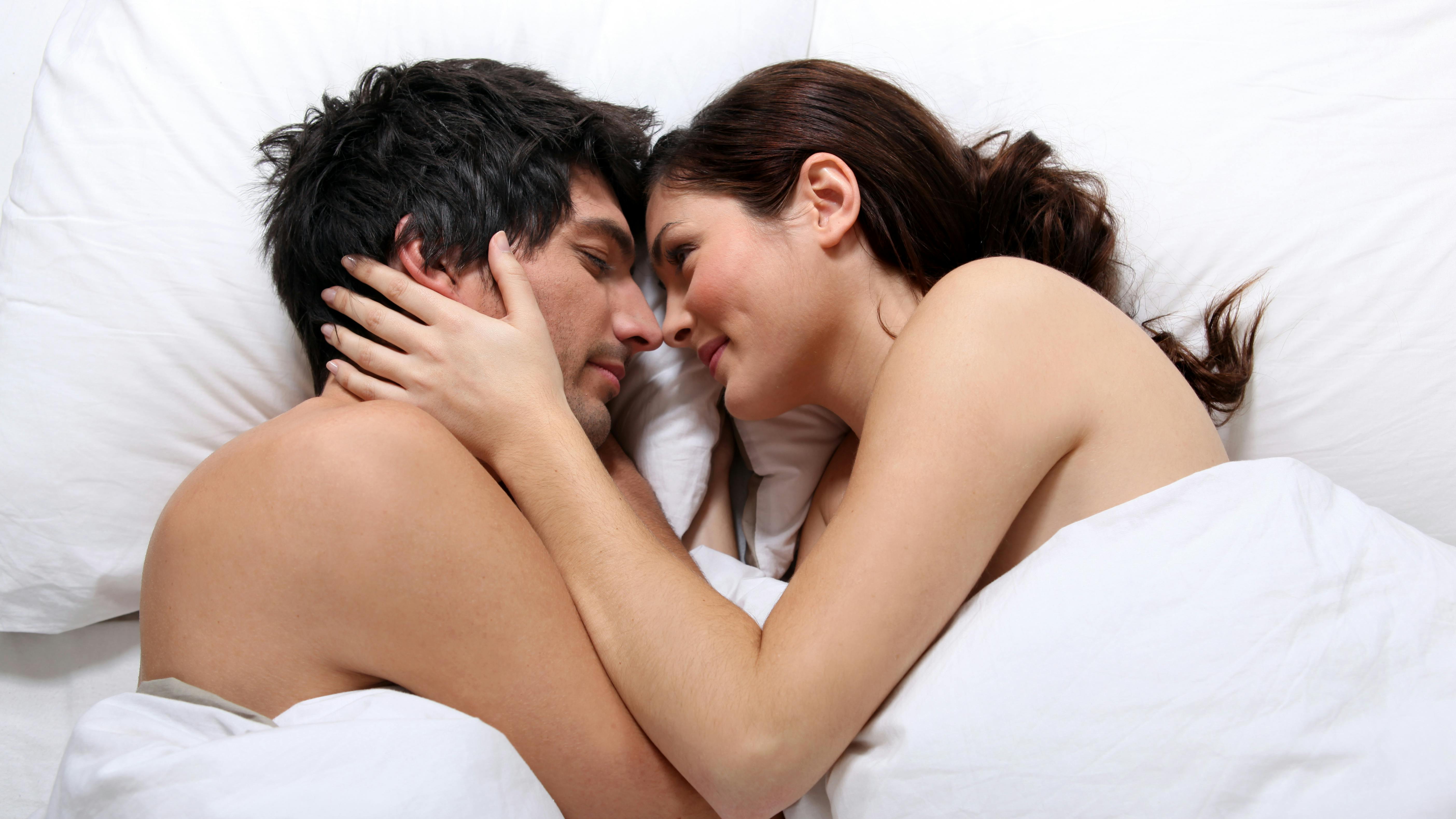 Naked couple in bed