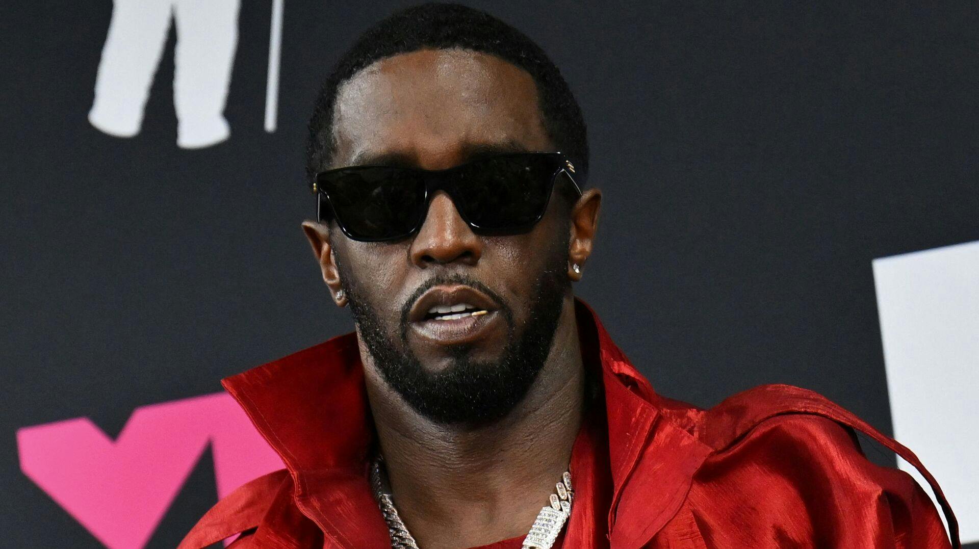 (FILES) US producer-musician Sean "Diddy" Combs poses with th