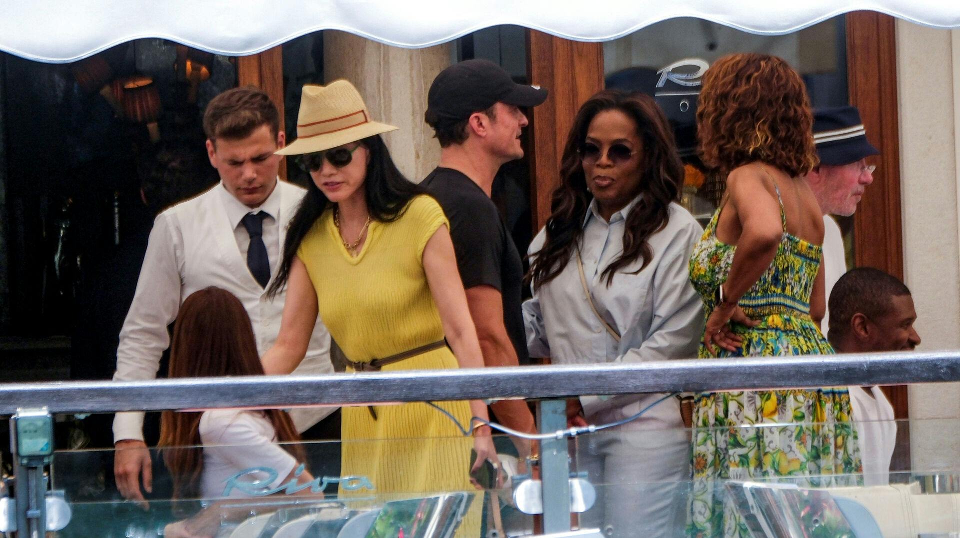 Oprah Winfrey og Orlando Bloom synes nogenlunde klar til endnu en dag i kærlighedens tegn.