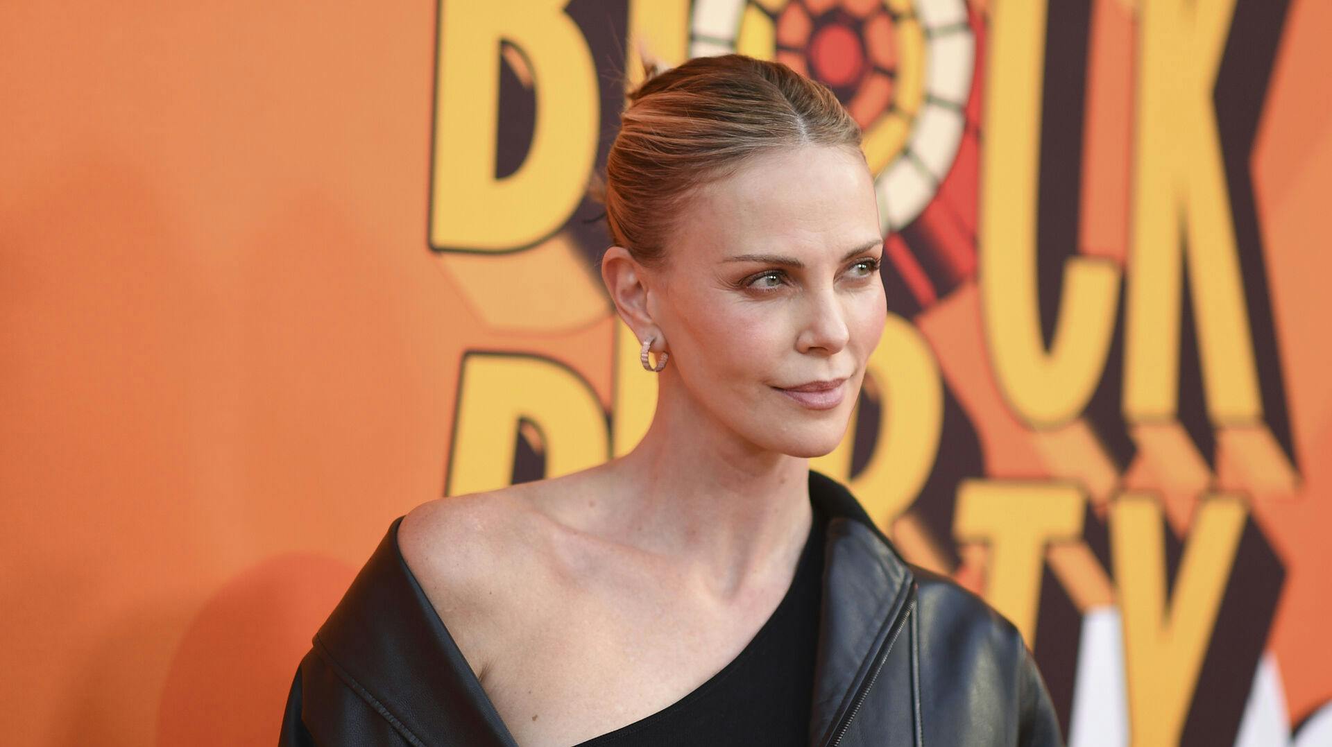 Charlize Theron arrives at the fifth annual Charlize Theron Africa Outreach Project Block Party on Saturday, June 28, 2025, at Universal Studios in Los Angeles. (Photo by Richard Shotwell/Invision/AP)
