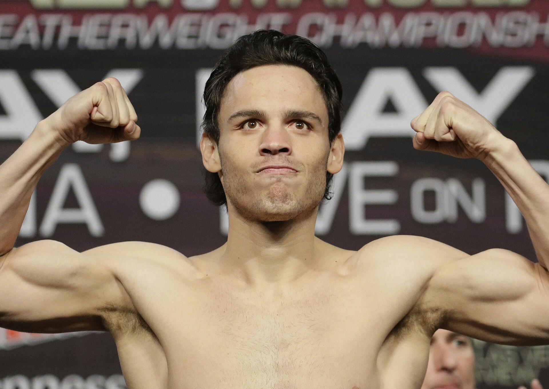 FILE - Julio Cesar Chavez Jr. poses for photographers during a weigh-in, in Las Vegas, May 5, 2017. (AP Photo/John Locher, File)