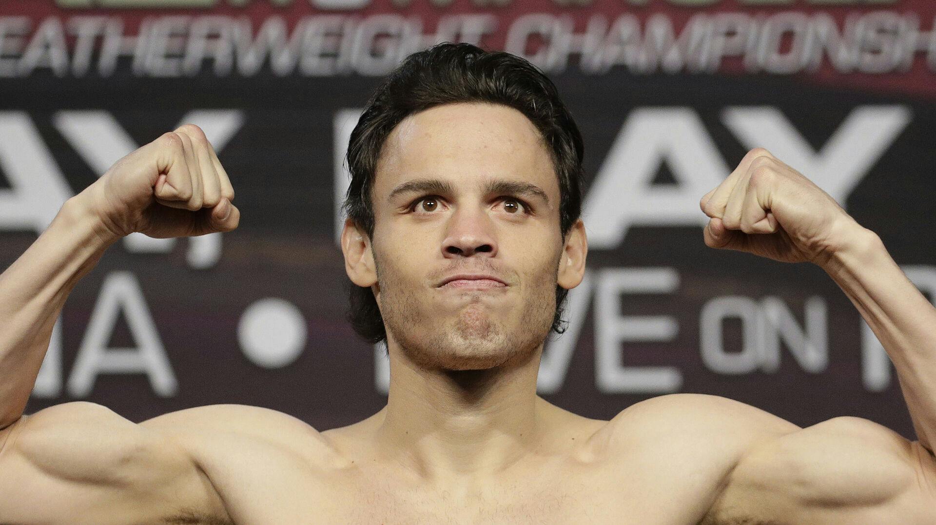 FILE - Julio Cesar Chavez Jr. poses for photographers during a weigh-in, in Las Vegas, May 5, 2017. (AP Photo/John Locher, File)